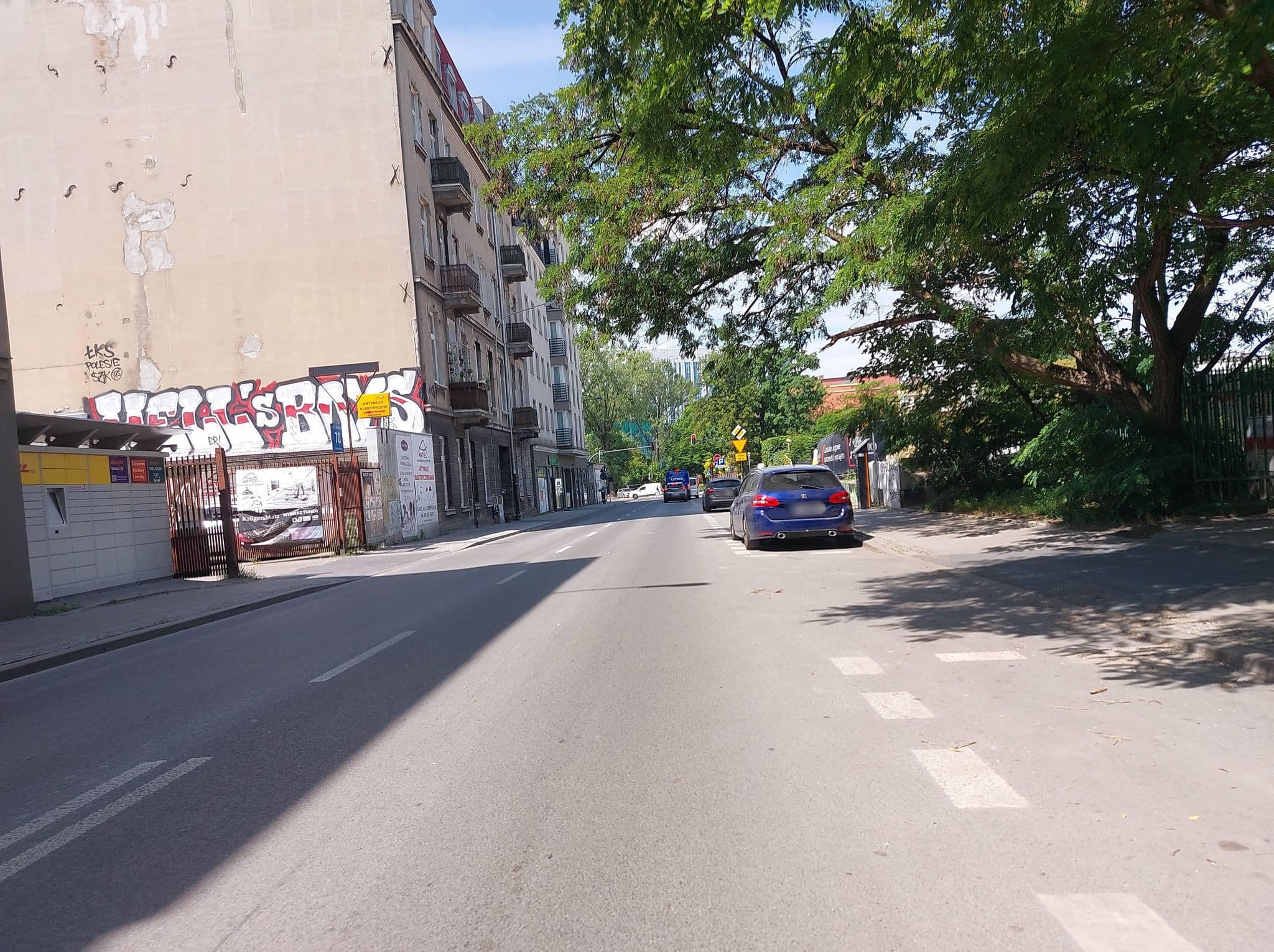Street view near Dom KD Kruk, Łódź — © Mikromobilnosc (CC BY-SA · Mapillary)