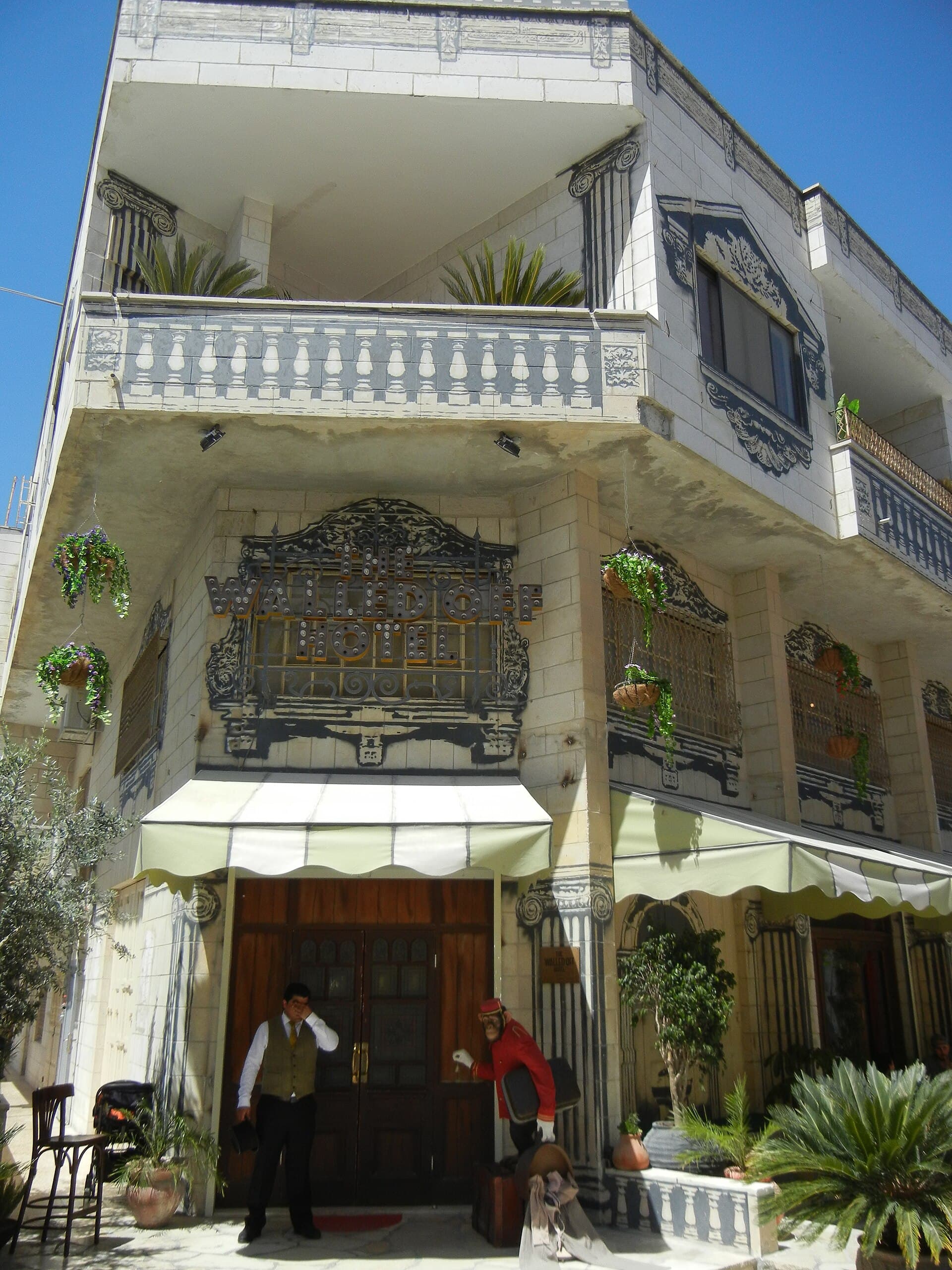 The Walled Off Hotel (via Wikimedia Commons, CC BY-SA 4.0)