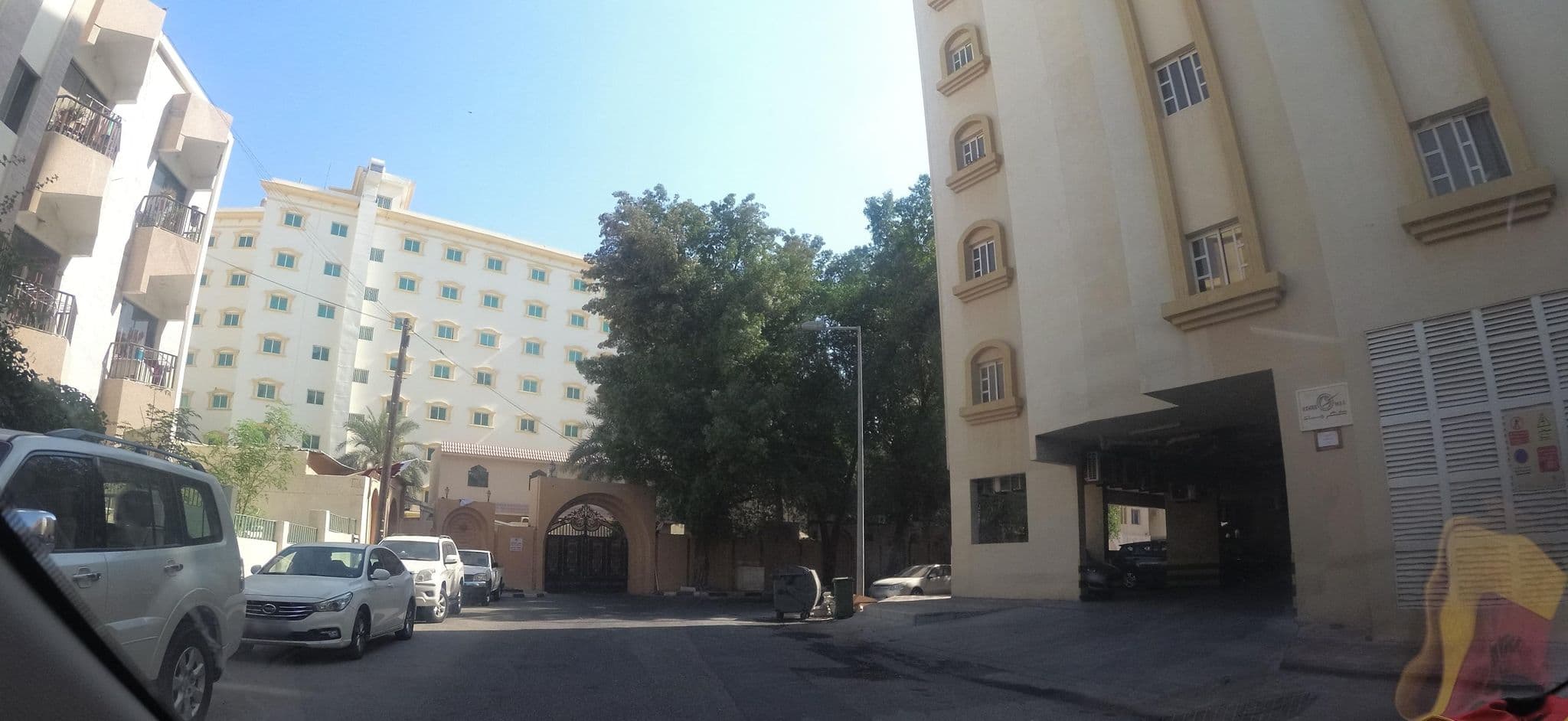 Street view near Al Mansoura Apartments, Al Manşūrah — © teddy73 (CC BY-SA · Mapillary)