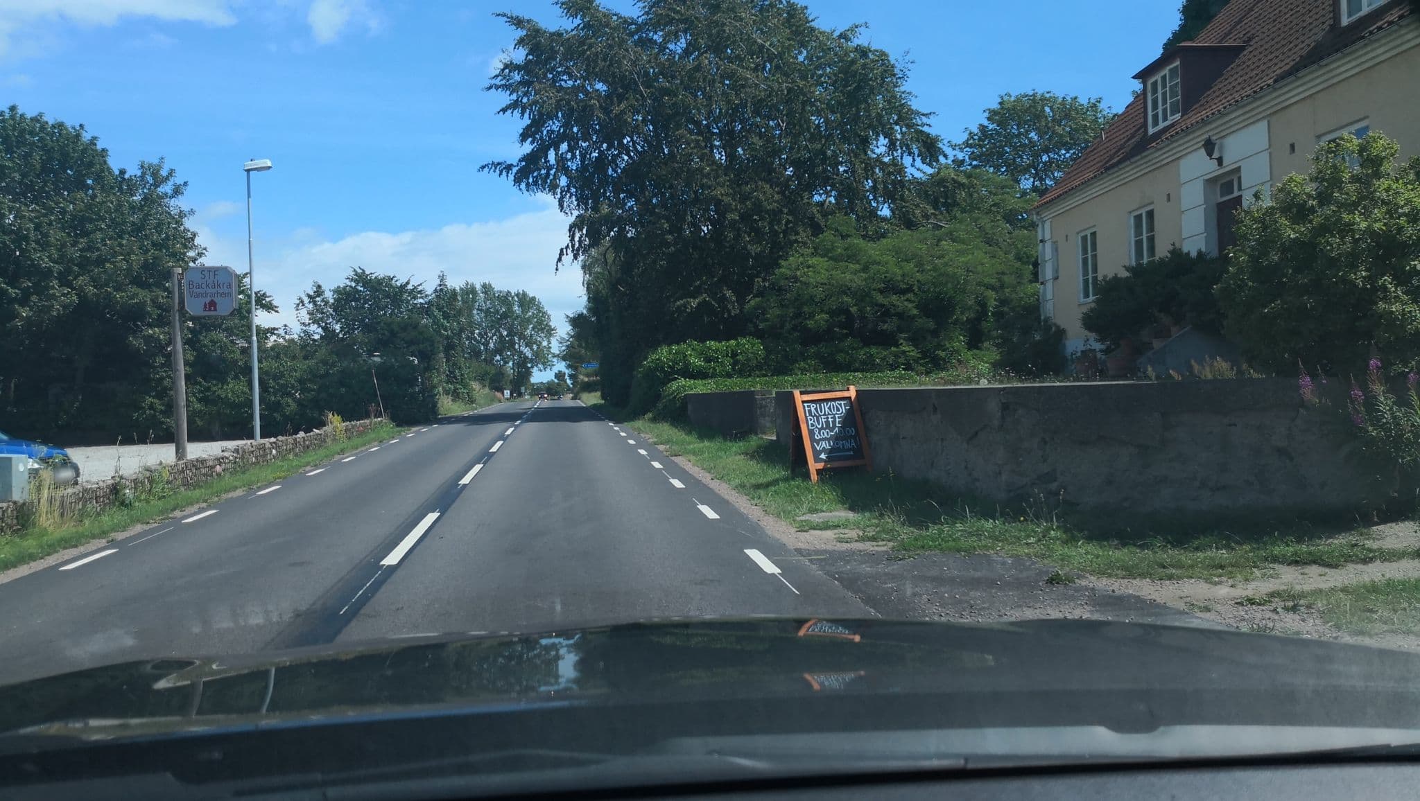 Street view near Backåkra vandrarhem, Köpingebro — © pjano (CC BY-SA · Mapillary)