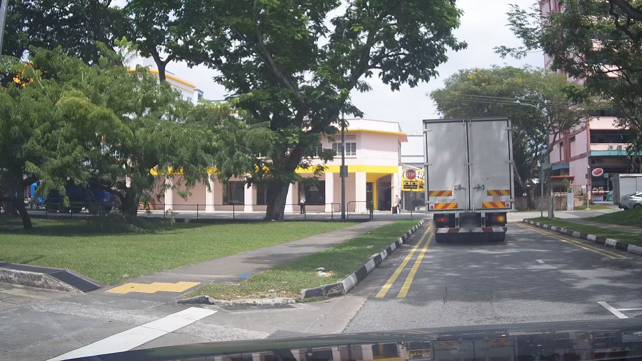 Street view near Regin Hotel, Geylang — © ashishgrab (CC BY-SA · Mapillary)