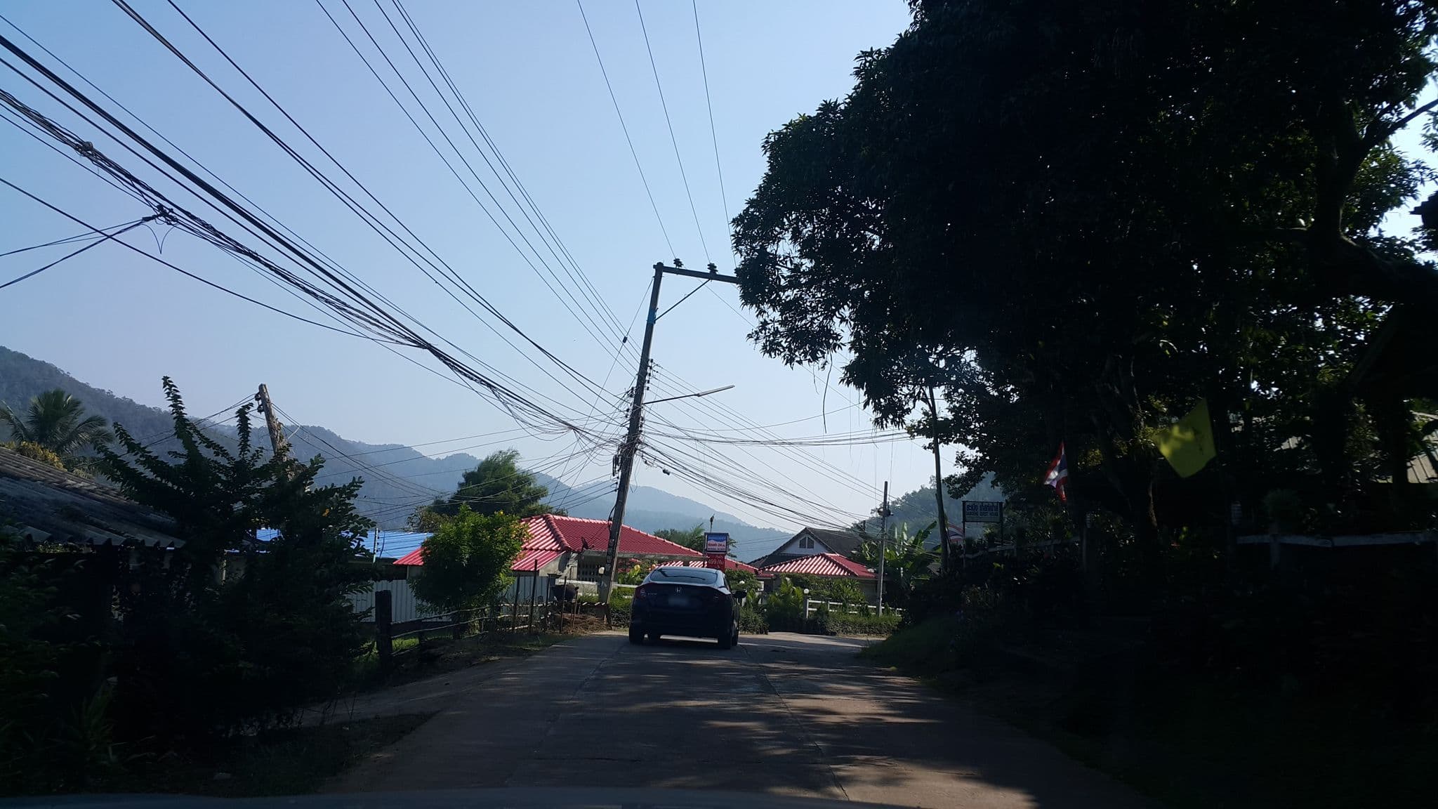 Street view near Samoeng Guesthouse, Hang Dong — © jrcarlsen (CC BY-SA · Mapillary)