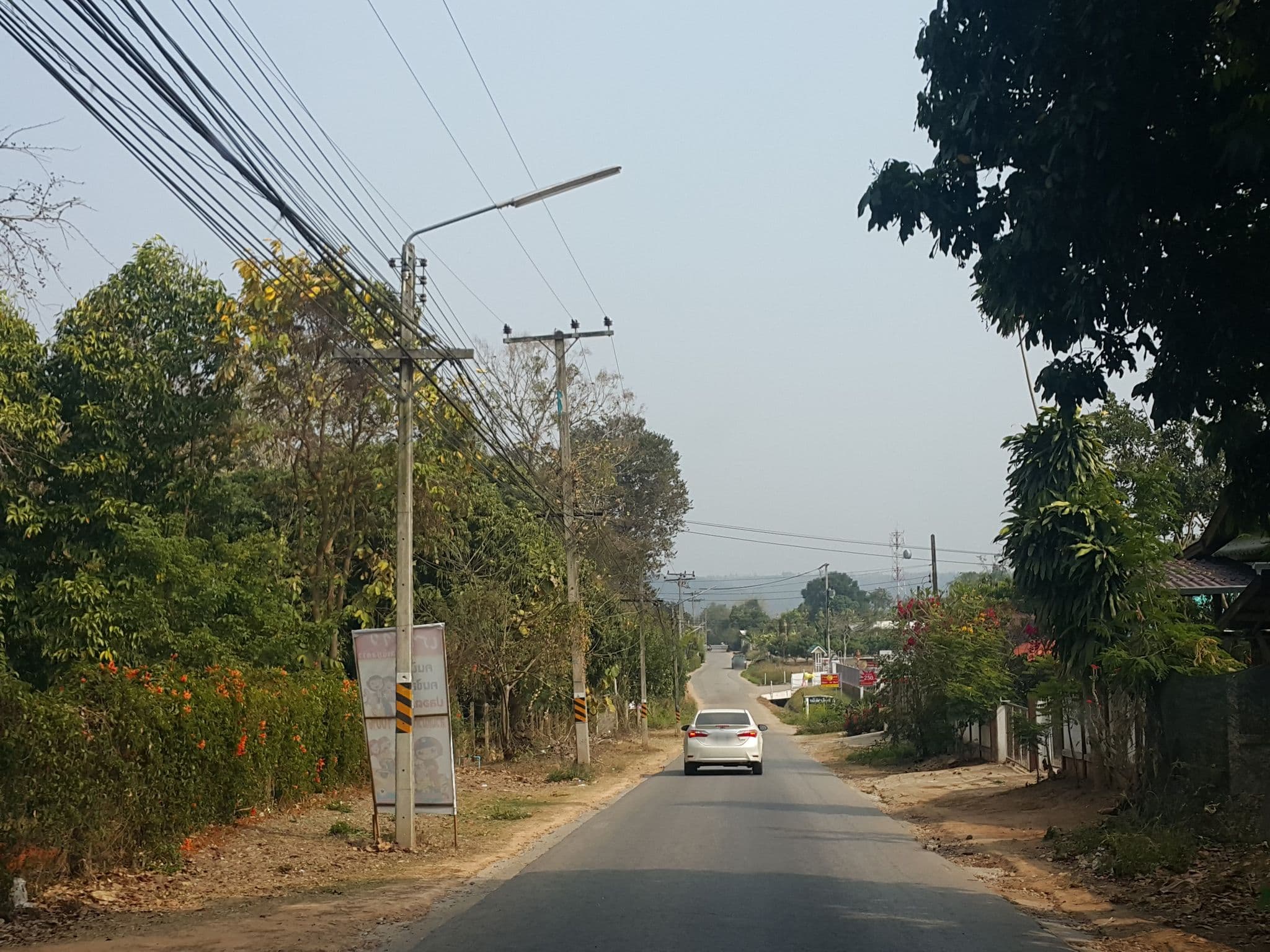 Street view near Baan Phusada, Ban Mae Waen — © jrcarlsen (CC BY-SA · Mapillary)