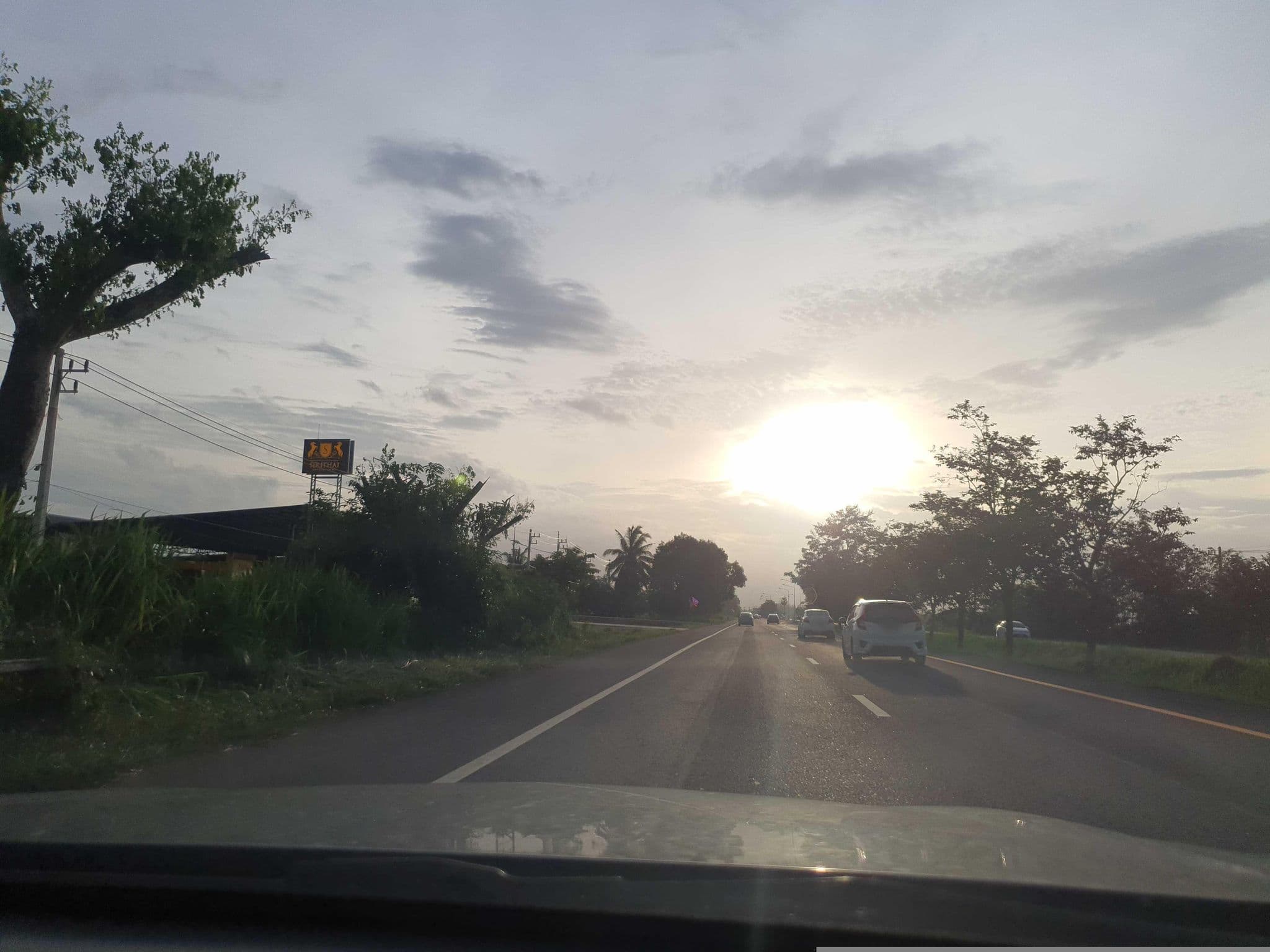 Street view near JC guesthouse, Tha Kham — © jrcarlsen (CC BY-SA · Mapillary)