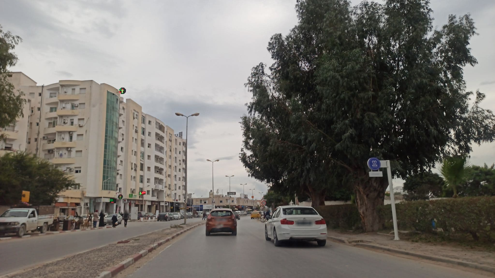 Street view near Beans & Co coffee house, Sukrah — © ghassen98 (CC BY-SA · Mapillary)