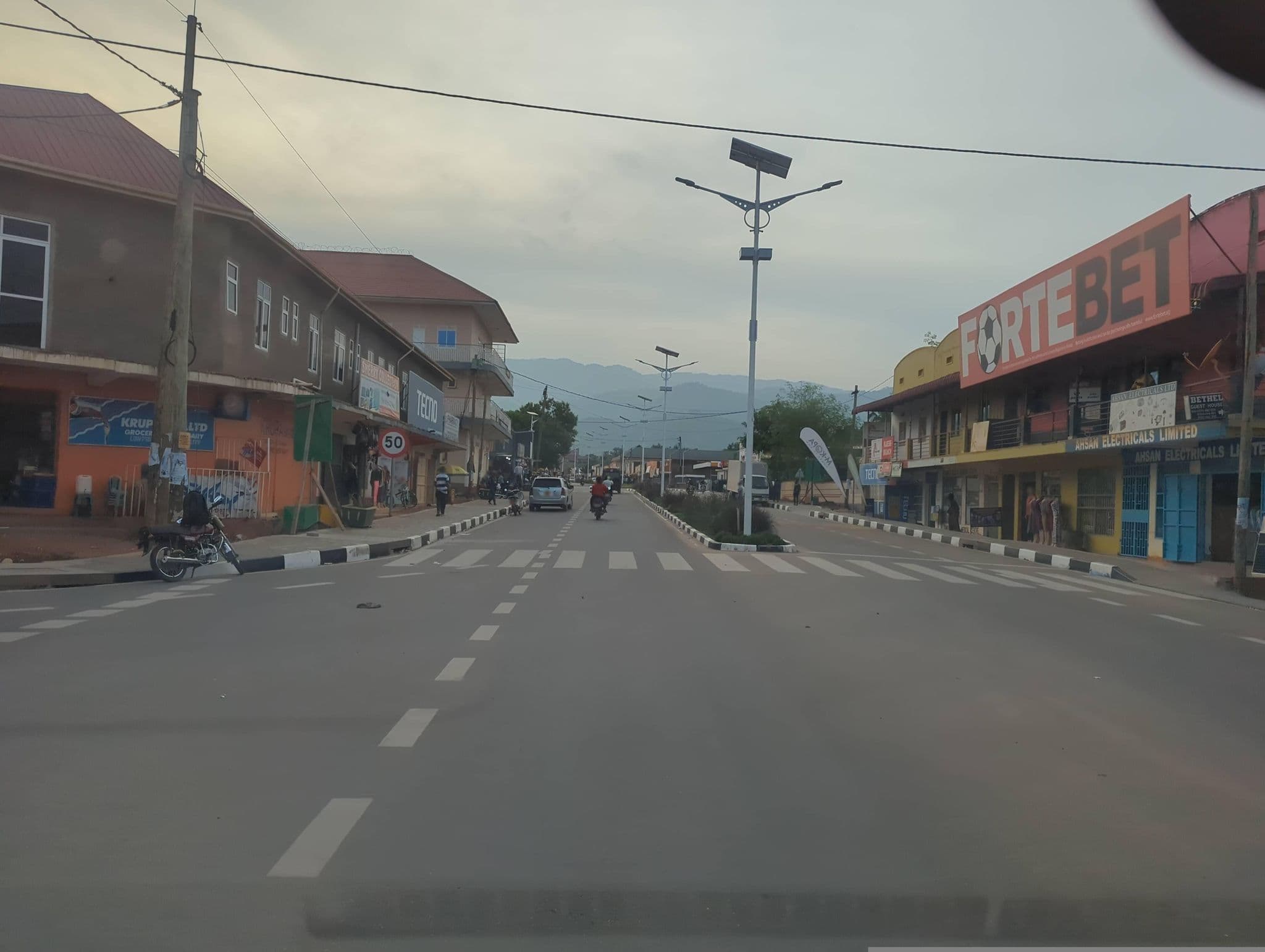Street view near Sandton Hotel, Kasese — © jfrek (CC BY-SA · Mapillary)