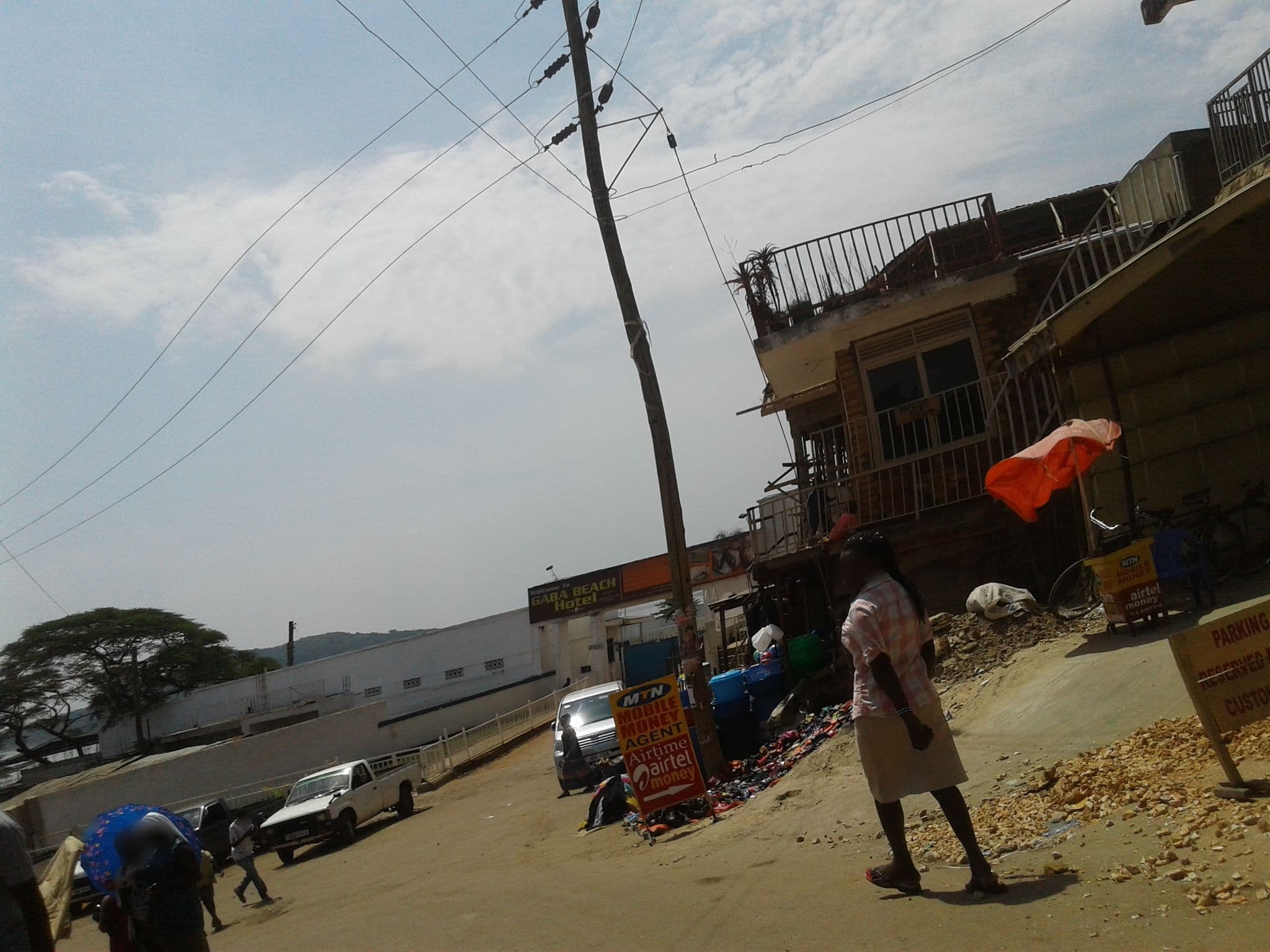 Street view near Clinc and Whole Sale Shops, Bunamwaya — © bagonzars (CC BY-SA · Mapillary)