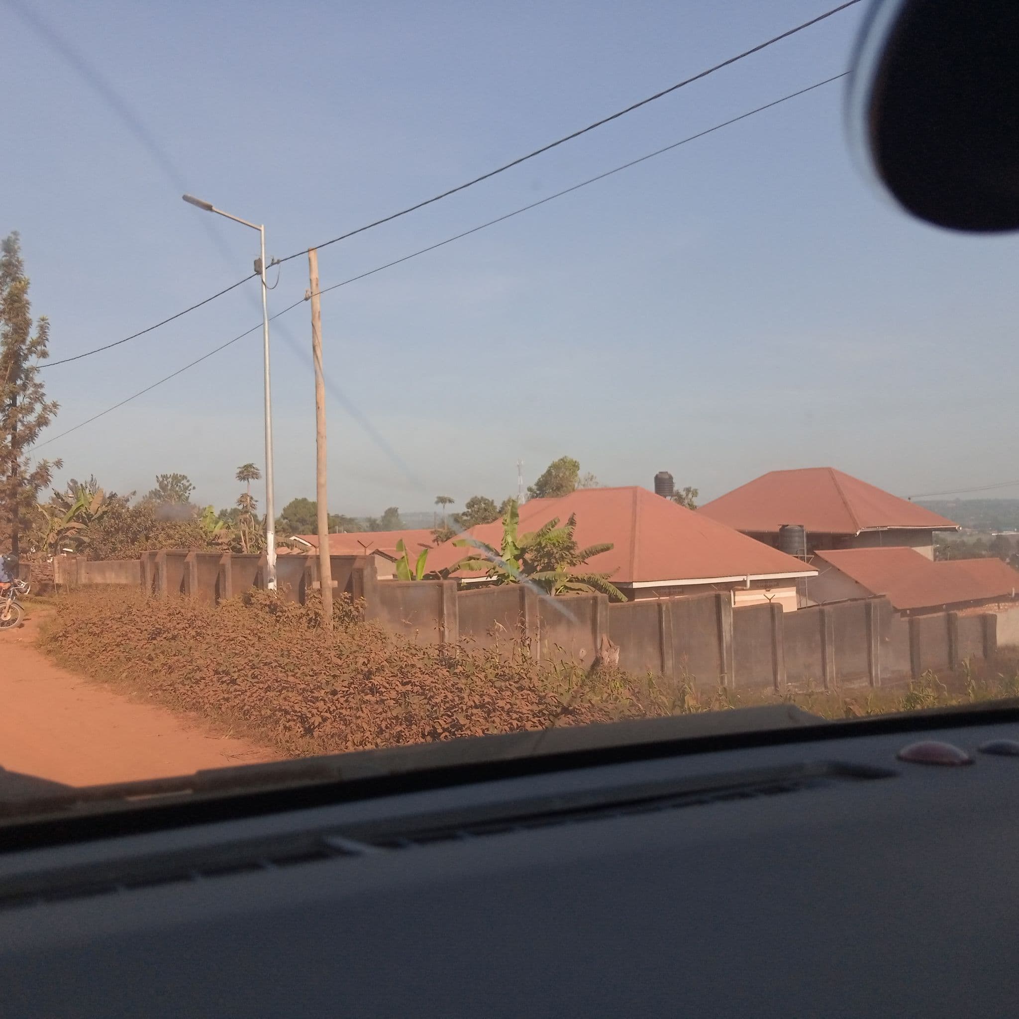 Street view near Banda Lodge, Masaka — © ngumenawesamson (CC BY-SA · Mapillary)