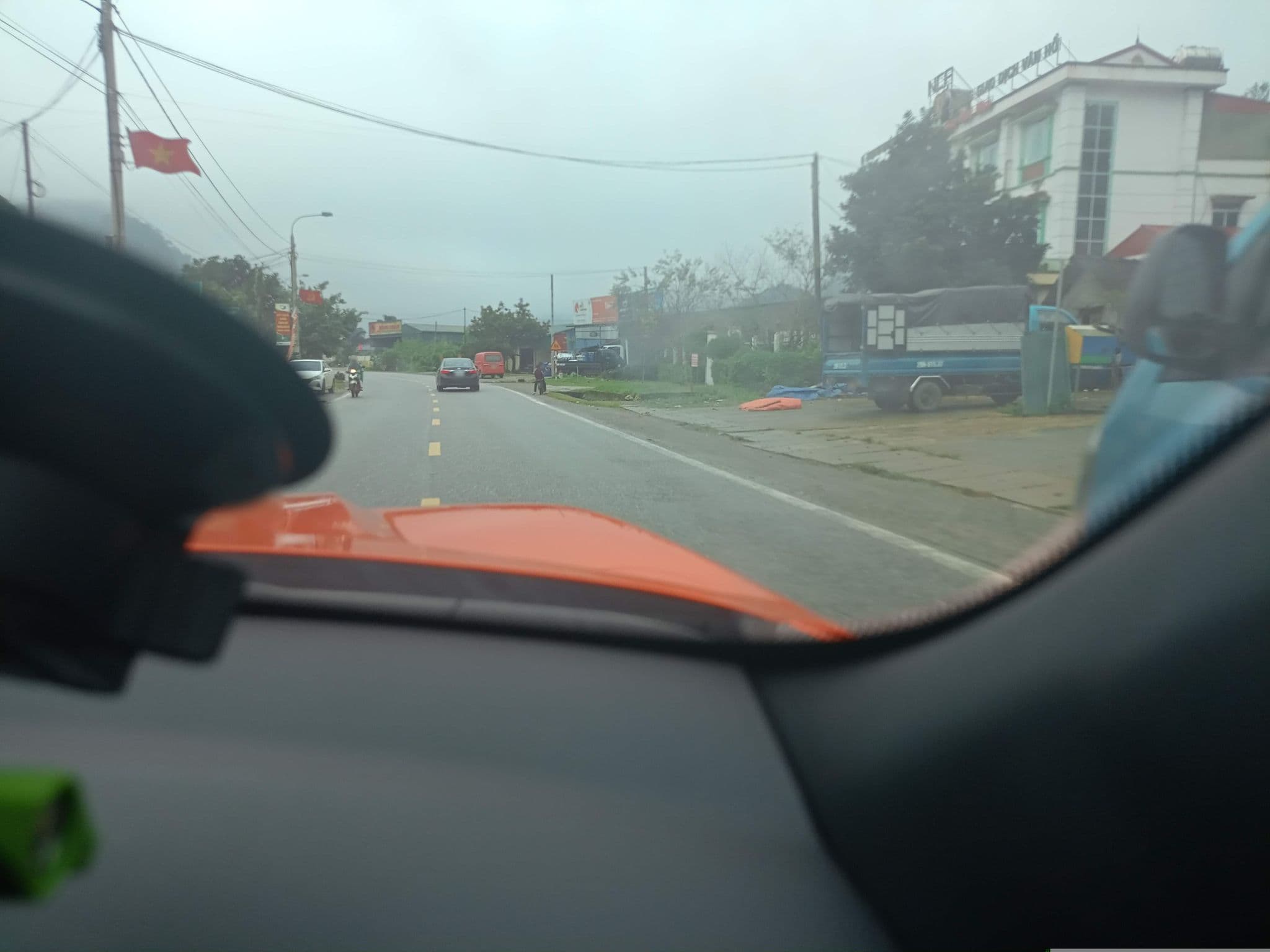 Street view near Nha Nghi, Long Cốc — © XeLangThang (CC BY-SA · Mapillary)