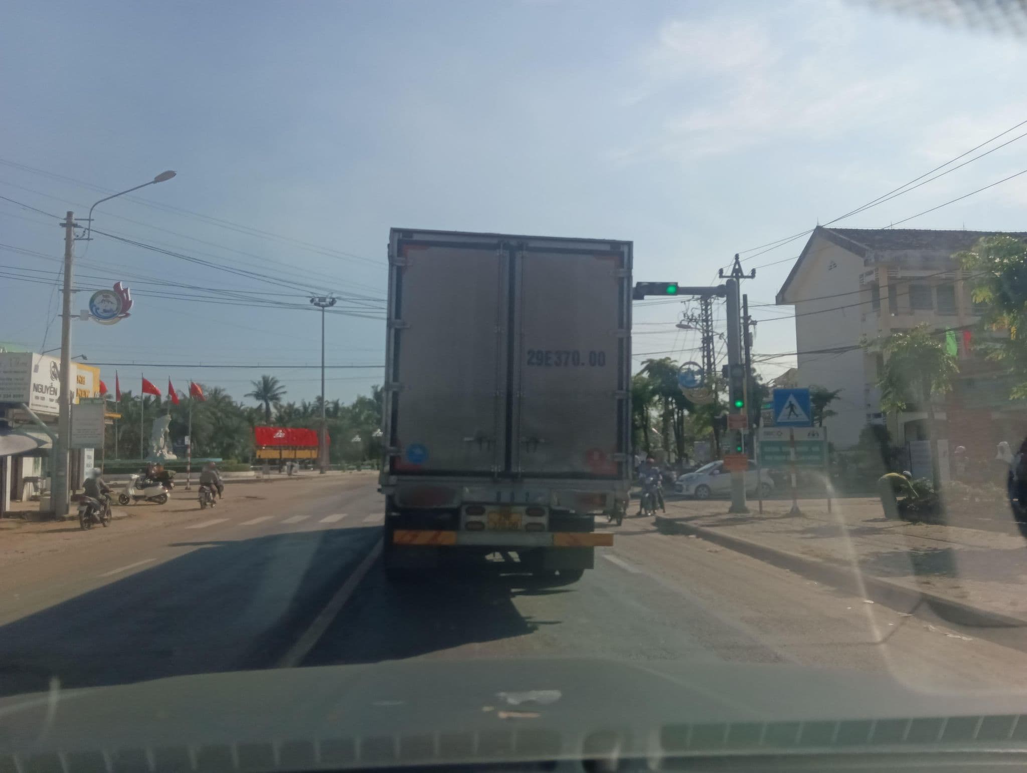 Street view near Tan Phat Nhà Nghí, Đức Phổ — © builangbat (CC BY-SA · Mapillary)