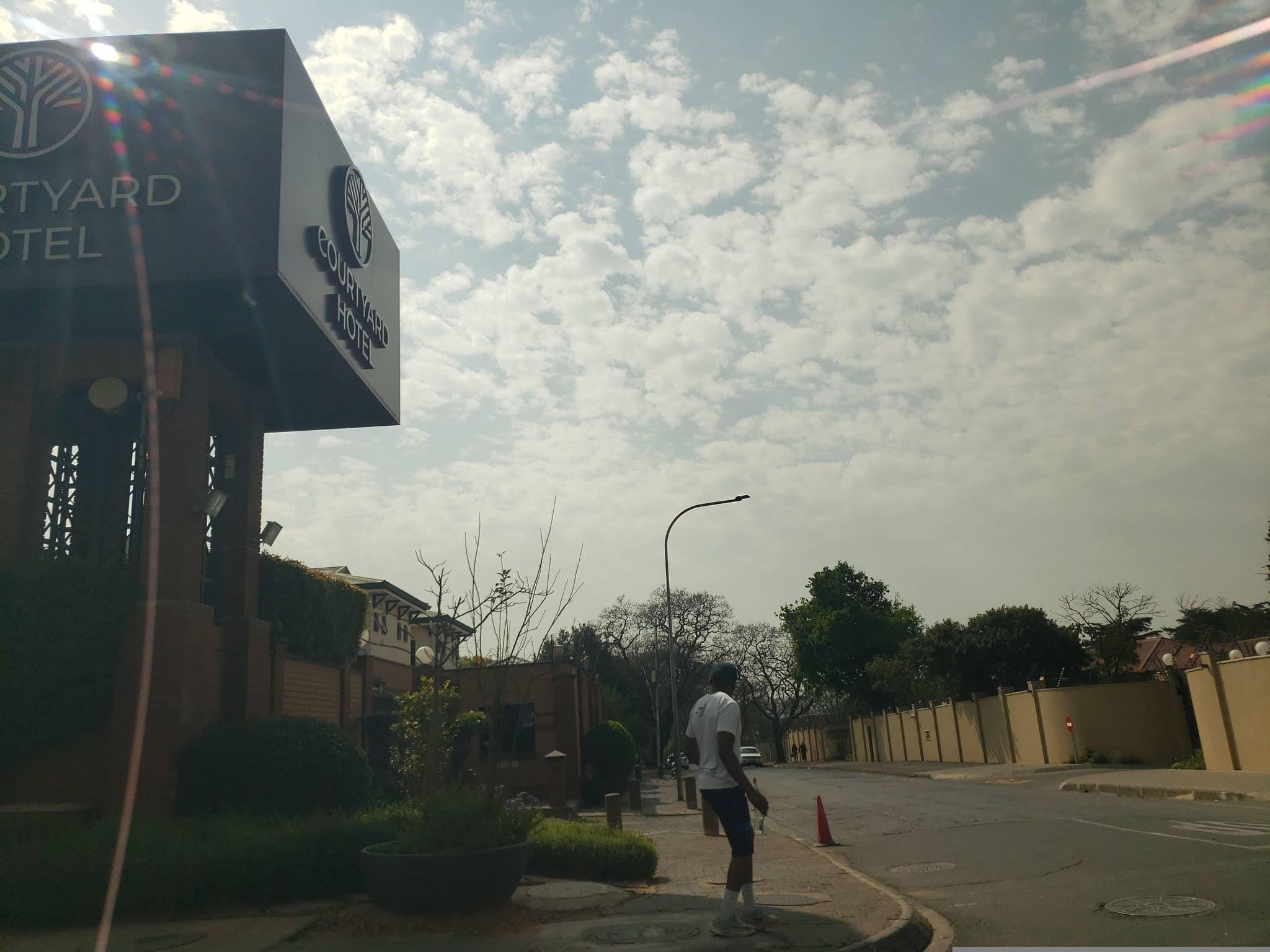 Street view near Courtyard Hotel Rosebank, Johannesburg — © mapfool (CC BY-SA · Mapillary)
