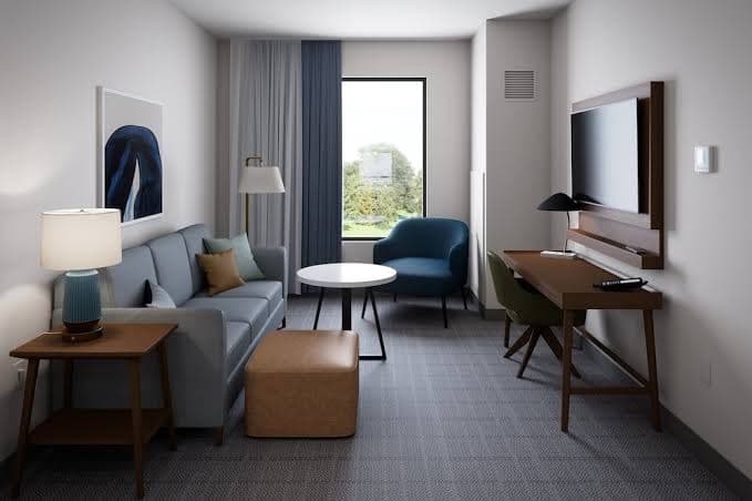 1 Bedroom Hotel Suite in Grand Rapids with AC, WiFi, Fitness Room and Breakfast, Hotel in Cutlerville
