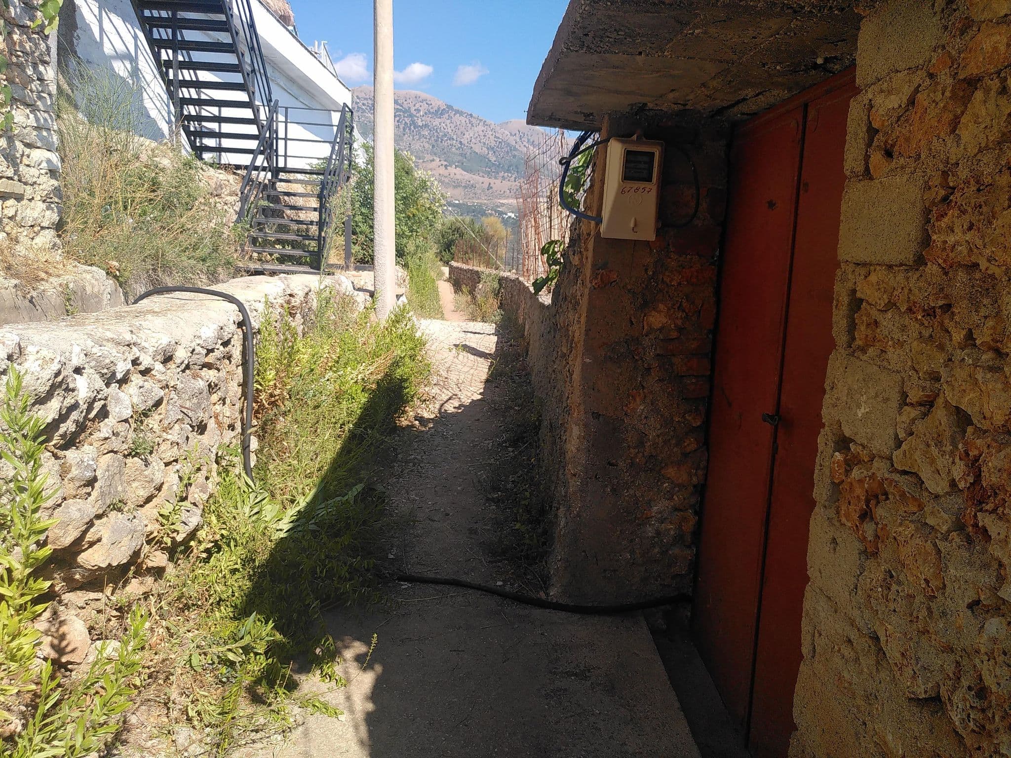 Street view near Blue Sea Apartment, Himarë — © sitarane (CC BY-SA · Mapillary)