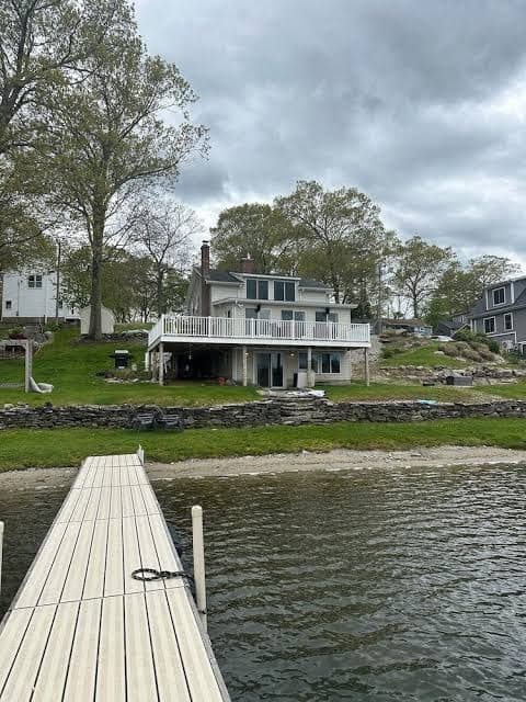 Located on Coventry Lake. Walk out the back door and you are in the lake!, Holiday Home in Coventry Lake