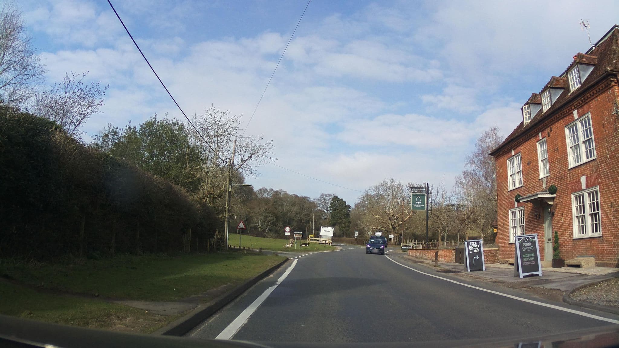 Street view near The Bell Inn, New Forest, Cadnam — © southglos (CC BY-SA · Mapillary)