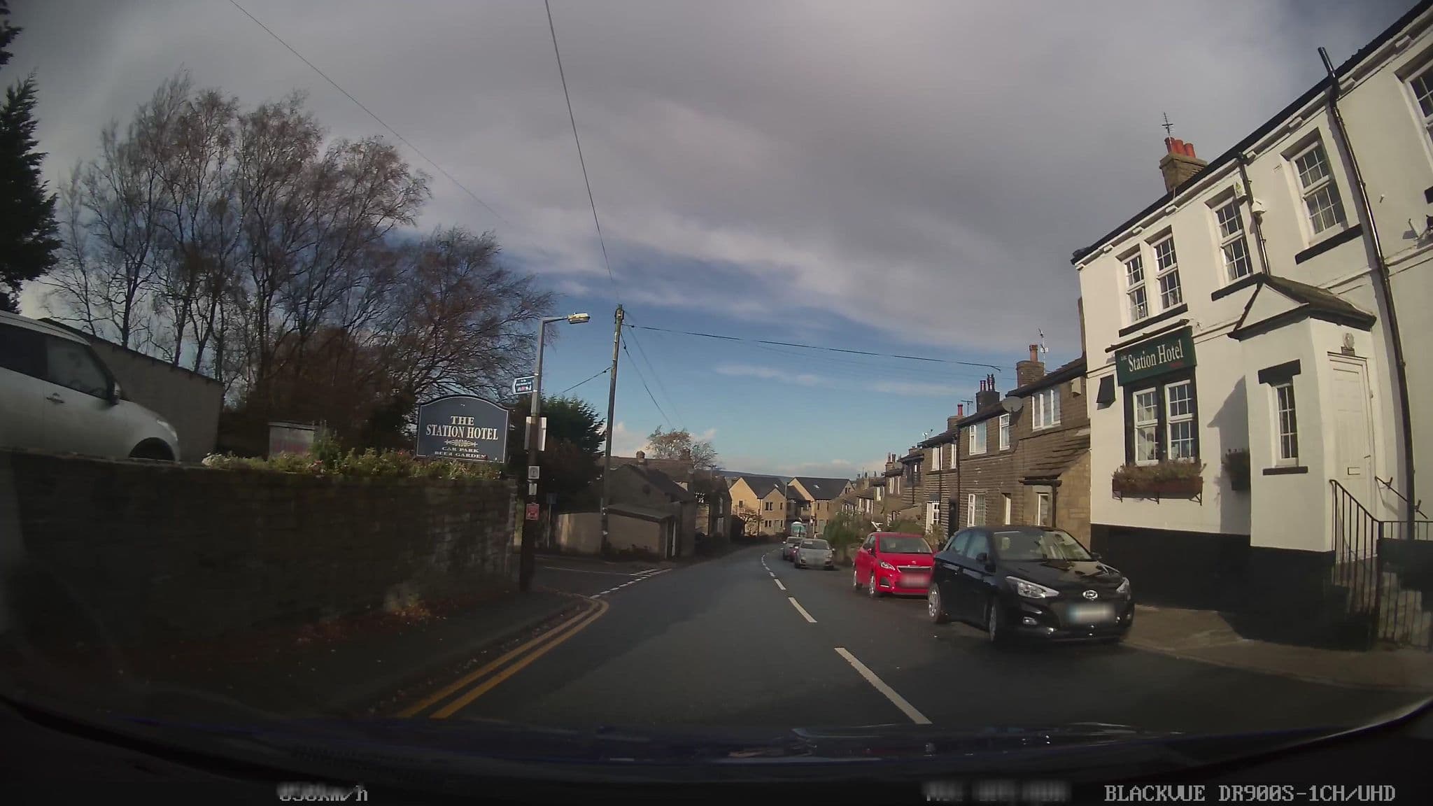 Street view near The Station Hotel, Wilsden — © humez (CC BY-SA · Mapillary)