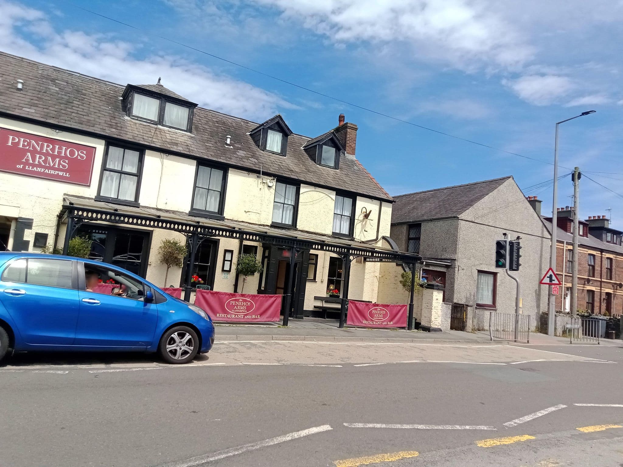 Street view near The Penrhos Arms, Llanfairpwllgwyngyll — © annekaro (CC BY-SA · Mapillary)