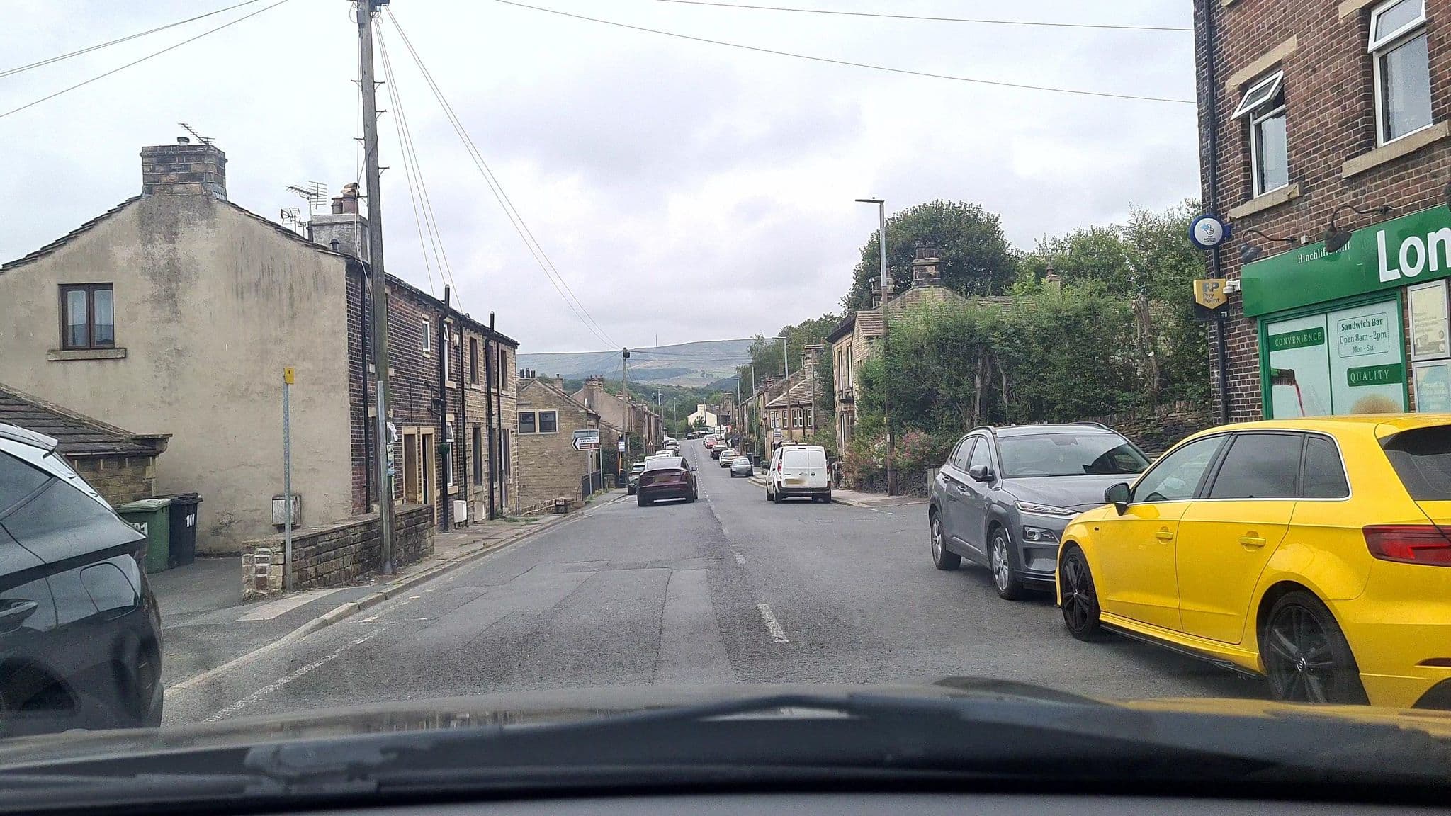 Street view near Stumble Inn, Holmfirth — © mappo2 (CC BY-SA · Mapillary)