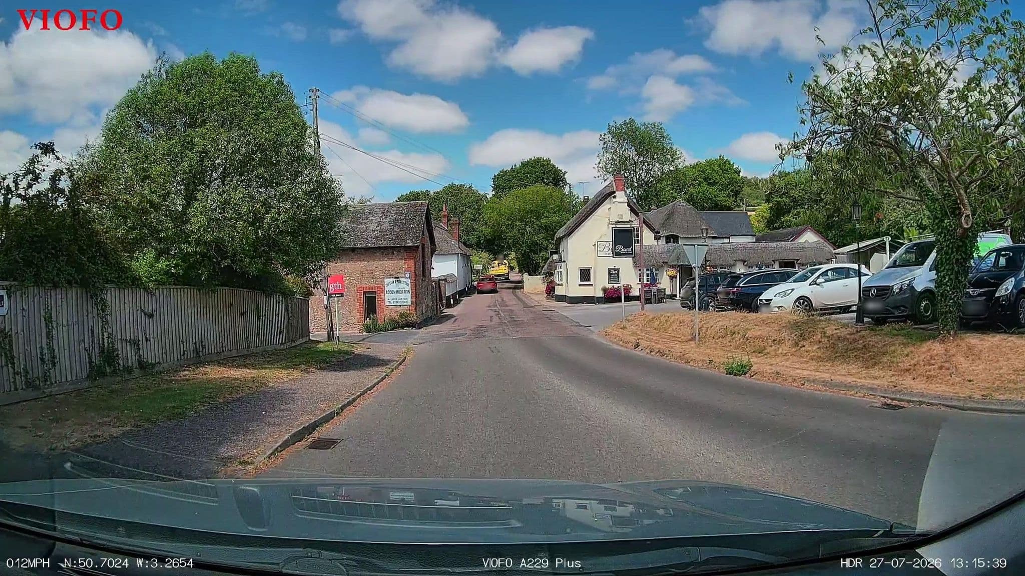 Street view near The Barn & Pinn Cottage, Newton Poppleford — © RyanBush (CC BY-SA · Mapillary)