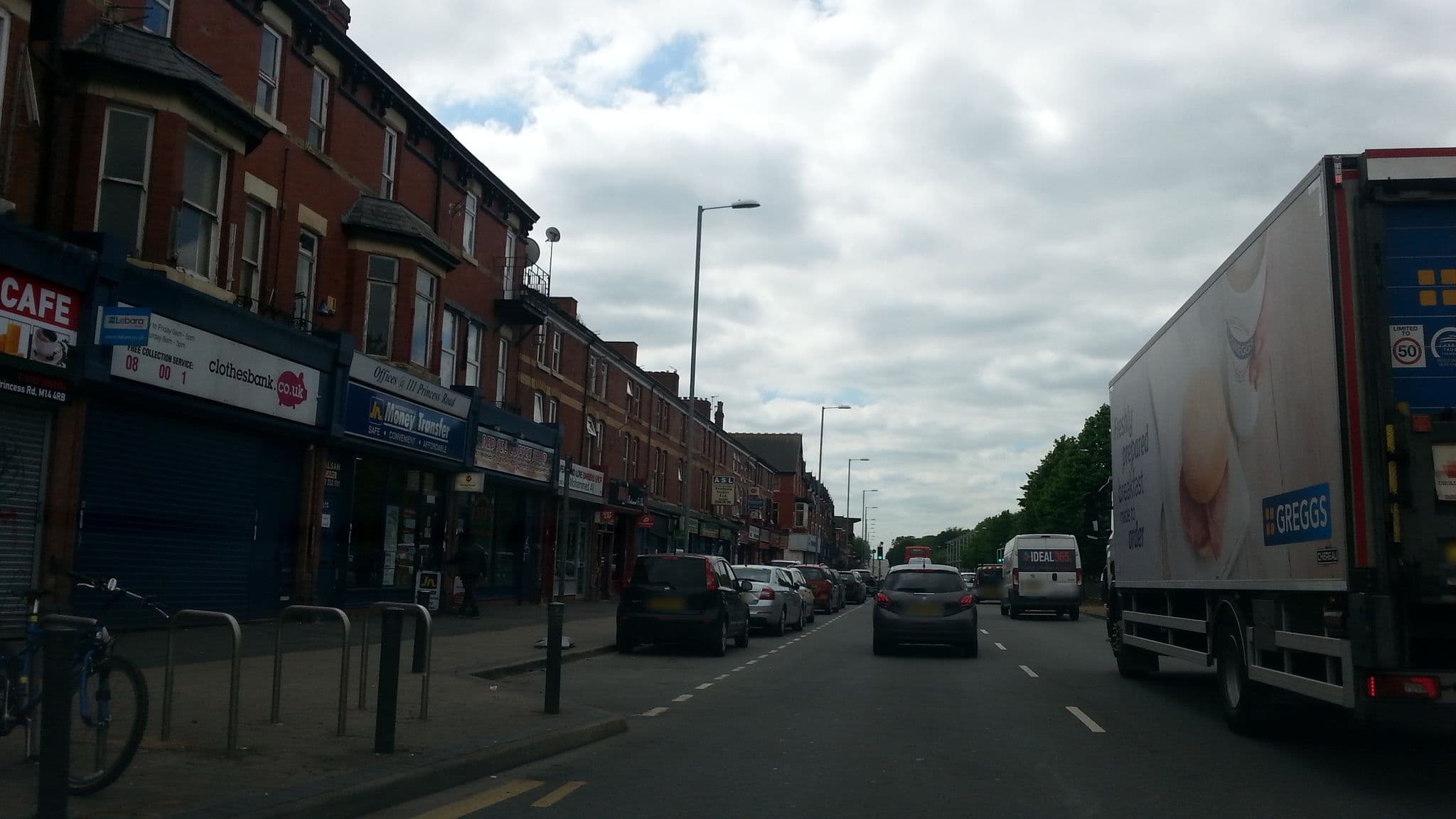 Street view near Patys Guest House, Hulme — © adam2 (CC BY-SA · Mapillary)