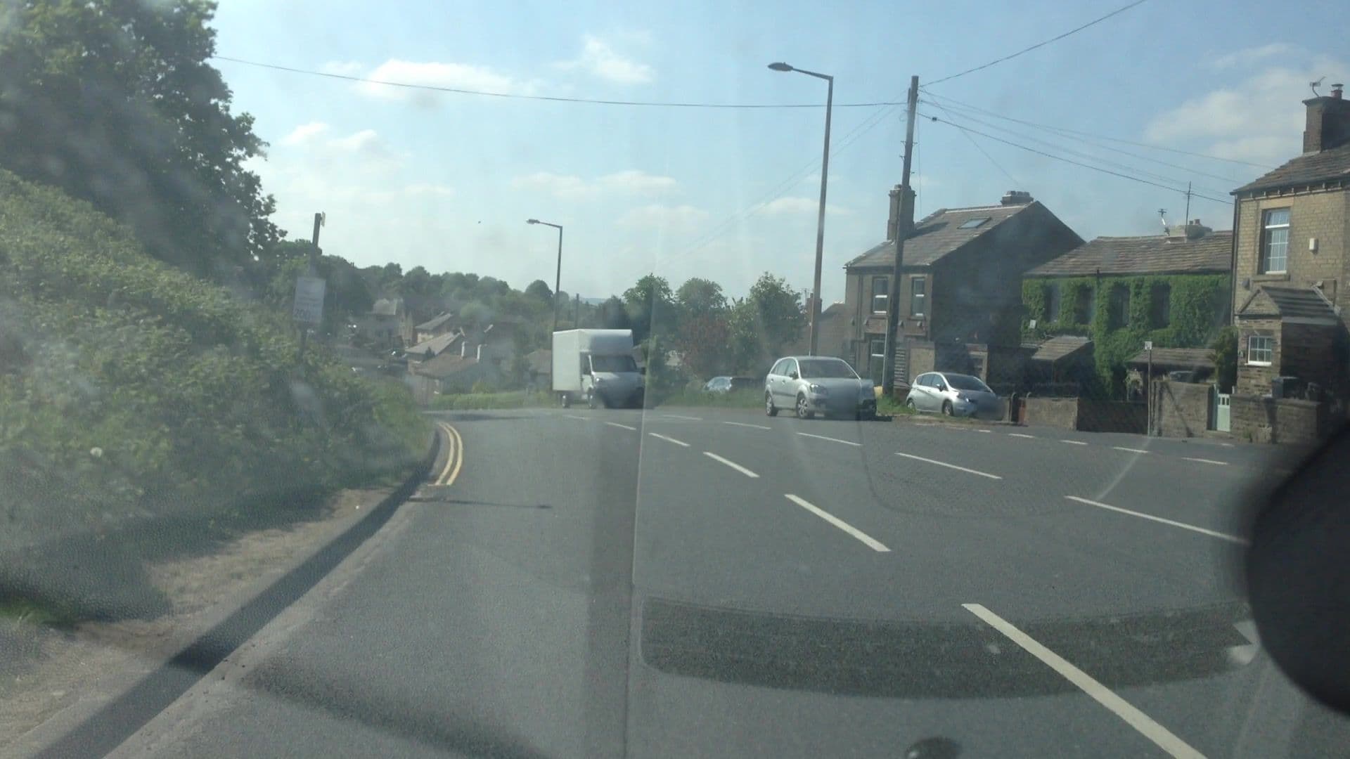 Street view near ROUNDHILL INN, Rastrick — © lvl5 (CC BY-SA · Mapillary)