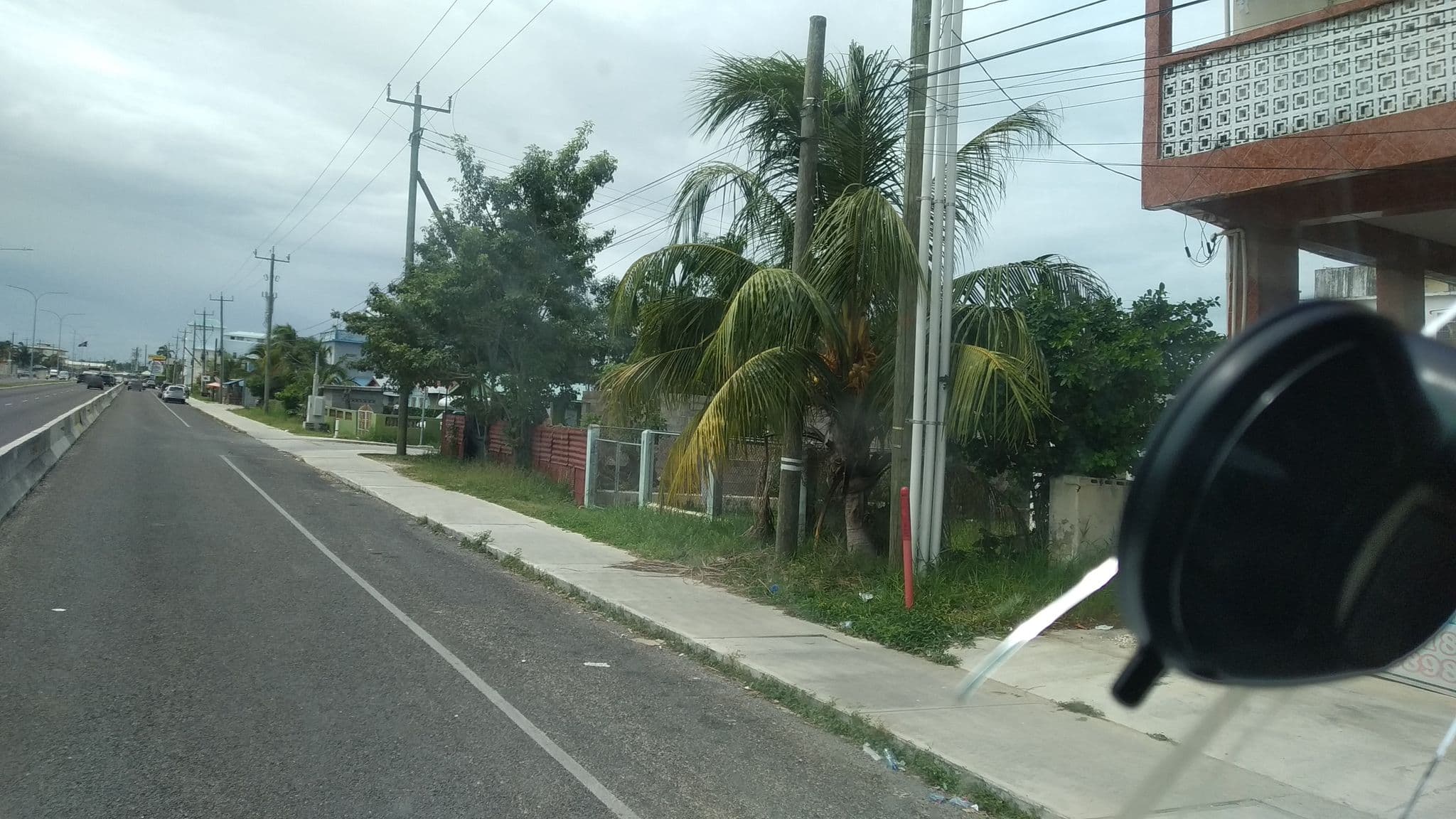 Street view near Caribbean Hotel, Belize City — © charlieplett (CC BY-SA · Mapillary)