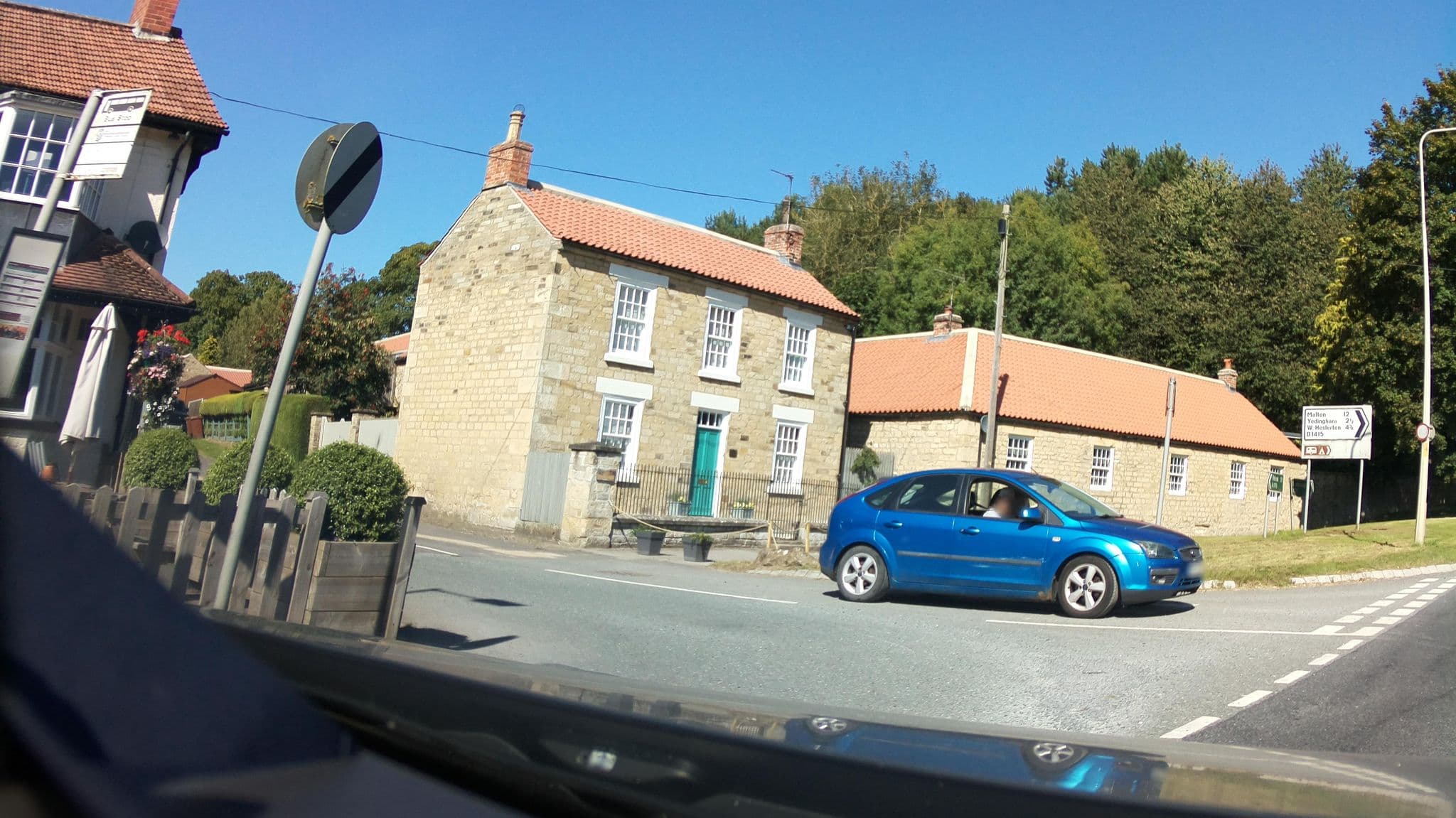 Street view near The Cayley Arms, Thornton Dale — © southglos (CC BY-SA · Mapillary)