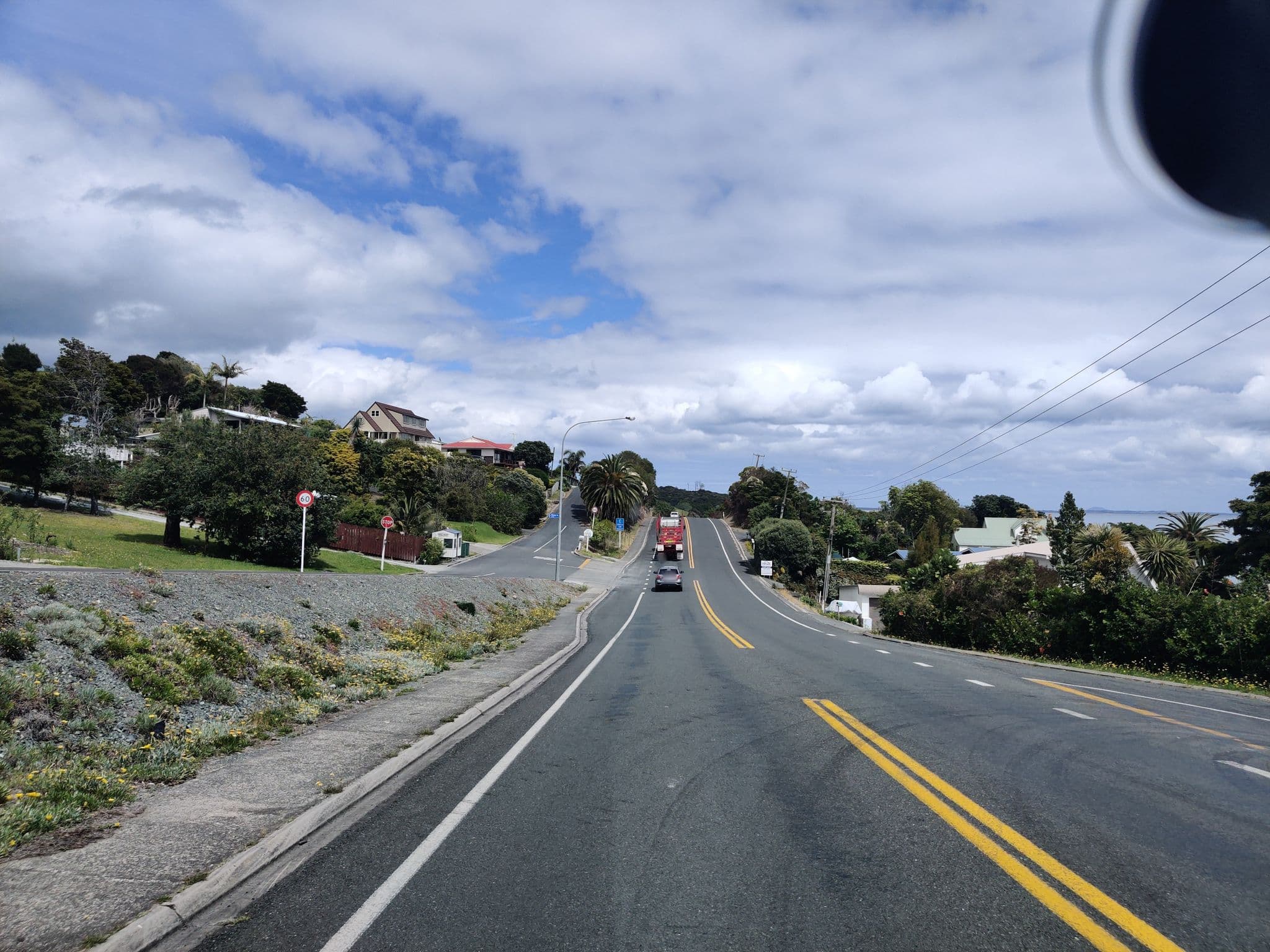 Street view near Cable Bay Cottages, Cable Bay — © elphix (CC BY-SA · Mapillary)