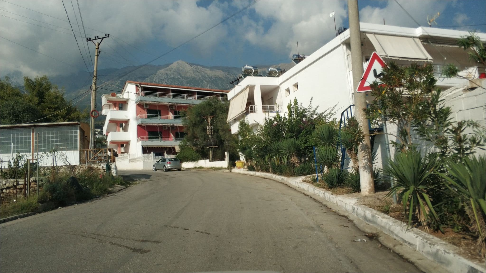 Street view near Hotel Villa Petro, Dhërmi — © freddouhelk (CC BY-SA · Mapillary)