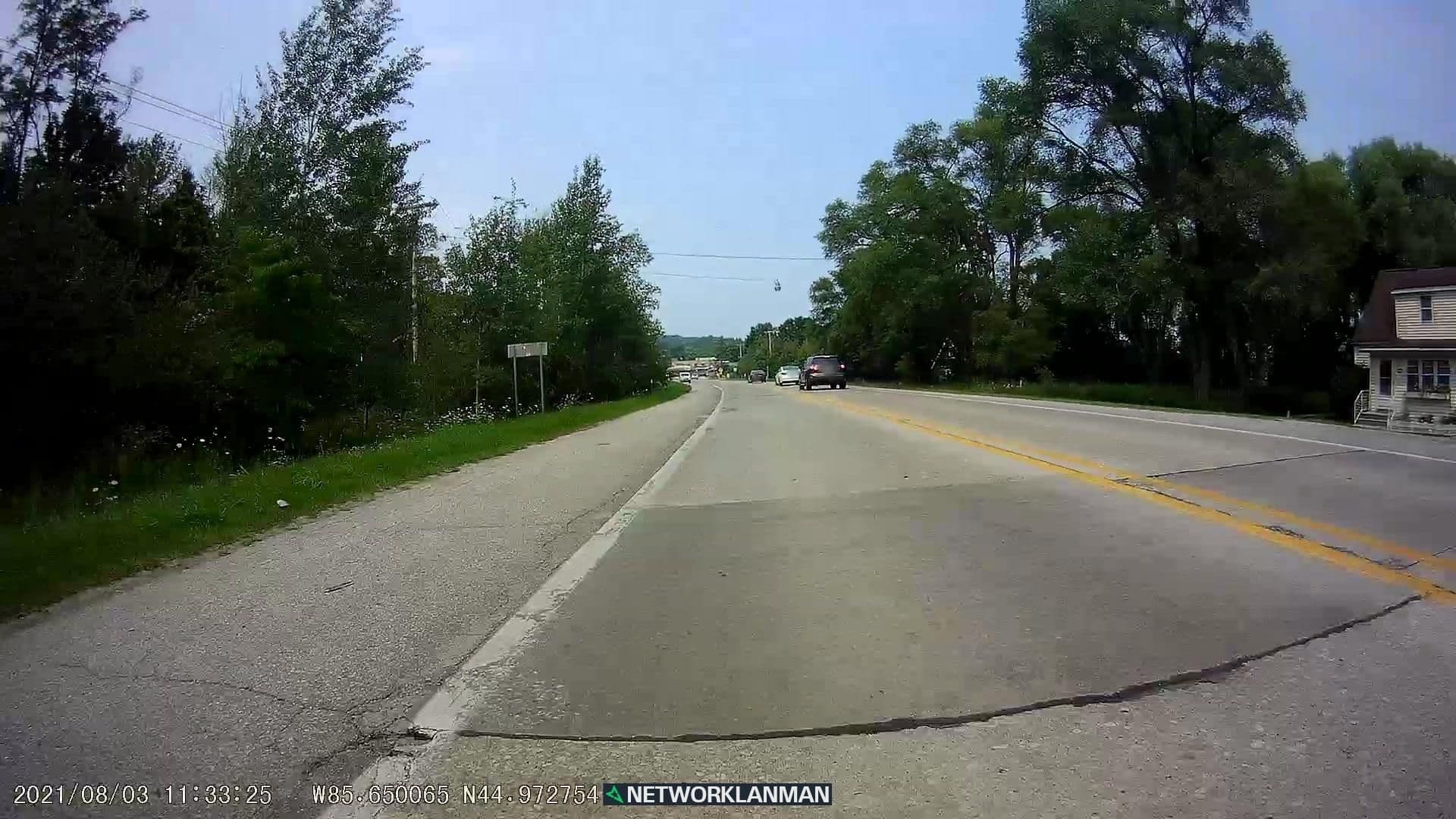 Street view near Swede Escape, Elk Rapids — © networklanman (CC BY-SA · Mapillary)
