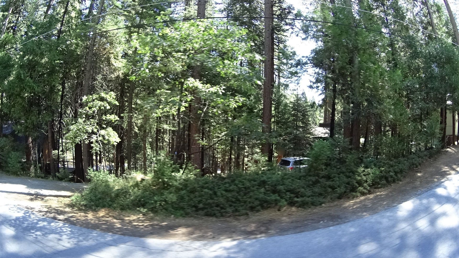 Street view near Wildflower Bungalow, Forest Meadows — © marker_geo (CC BY-SA · Mapillary)