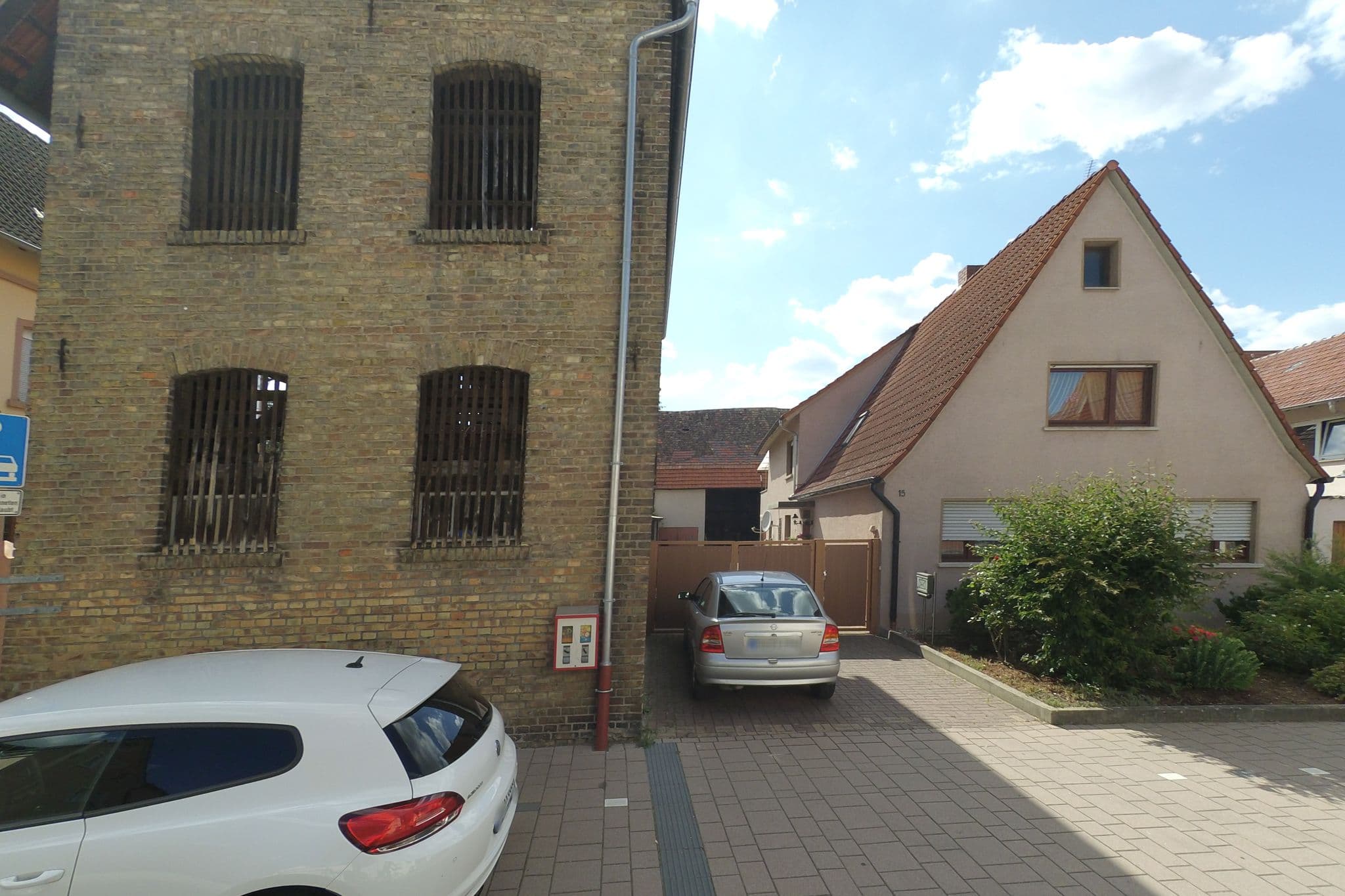 Street view near Elmis Boardinghouse, Heddesheim — © wegavision (CC BY-SA · Mapillary)