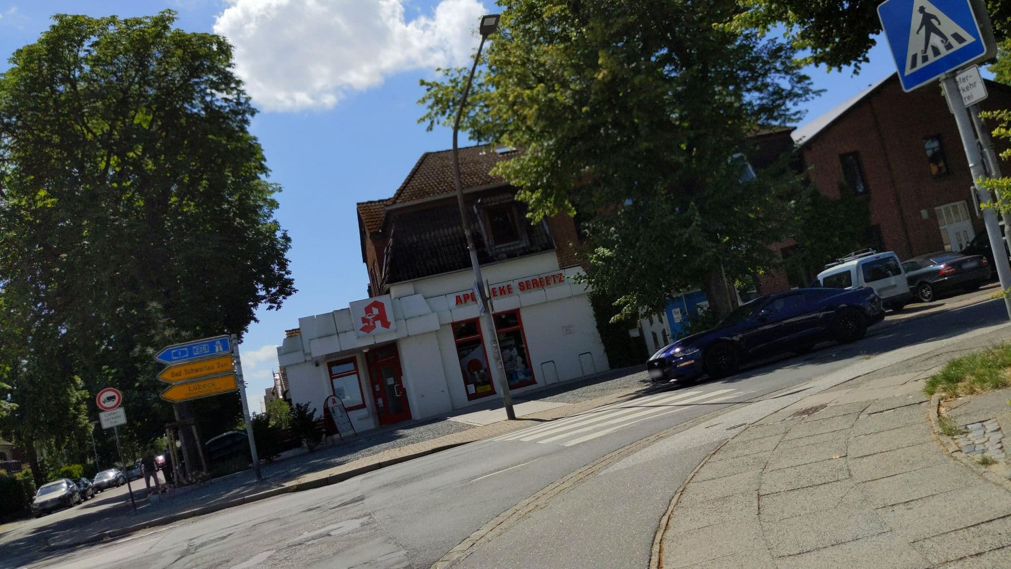 Street view near Gasthof Zum Kreuzweg, Bad Schwartau — © rasmustravemnd (CC BY-SA · Mapillary)