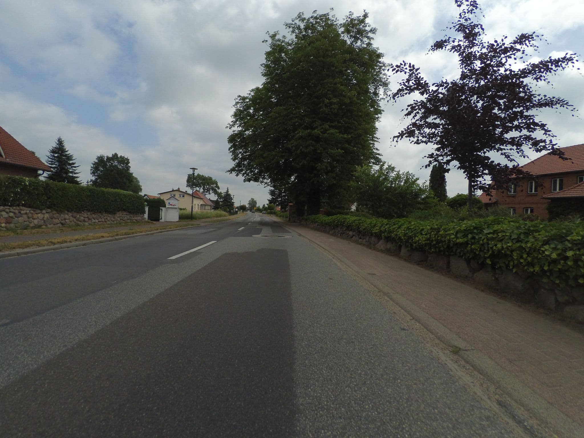 Street view near Appartementhaus Sonnengarten, Malchow — © peewee32 (CC BY-SA · Mapillary)