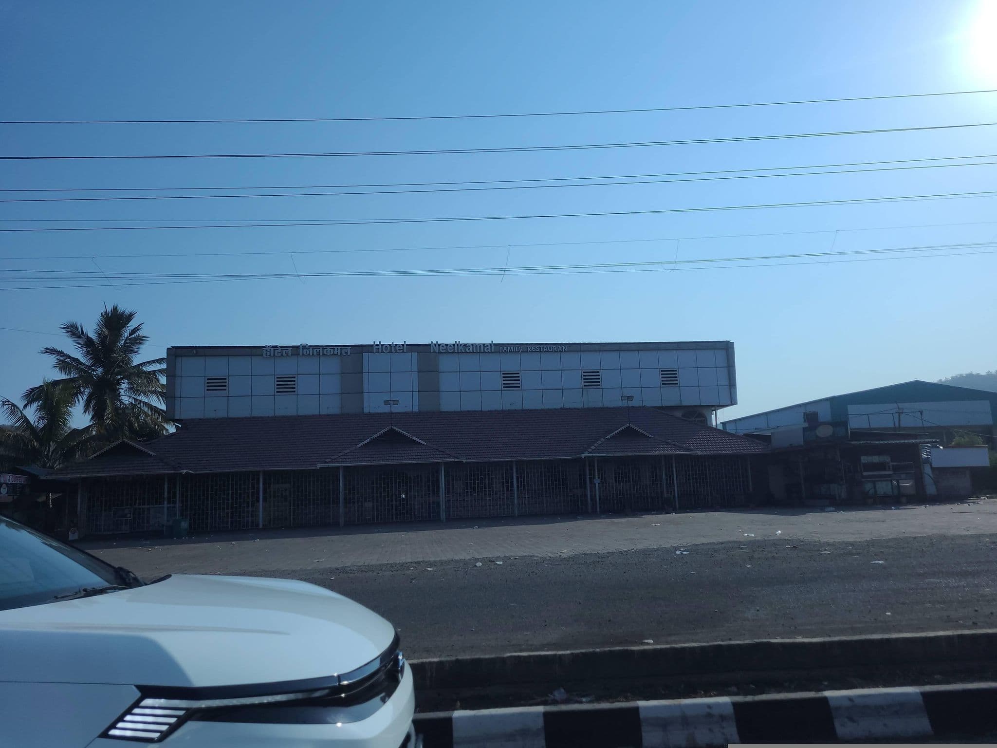 Street view near HoteL Nil Kamal, Māngvādi — © Dayaogale (CC BY-SA · Mapillary)