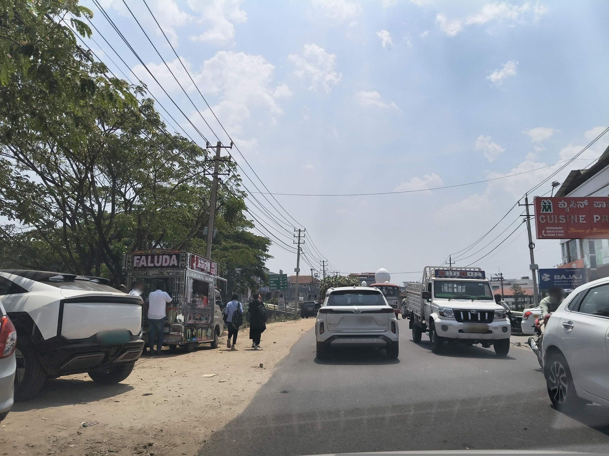Street view near Hotel Pranaam International, Gonikoppal — © ph4ni (CC BY-SA · Mapillary)