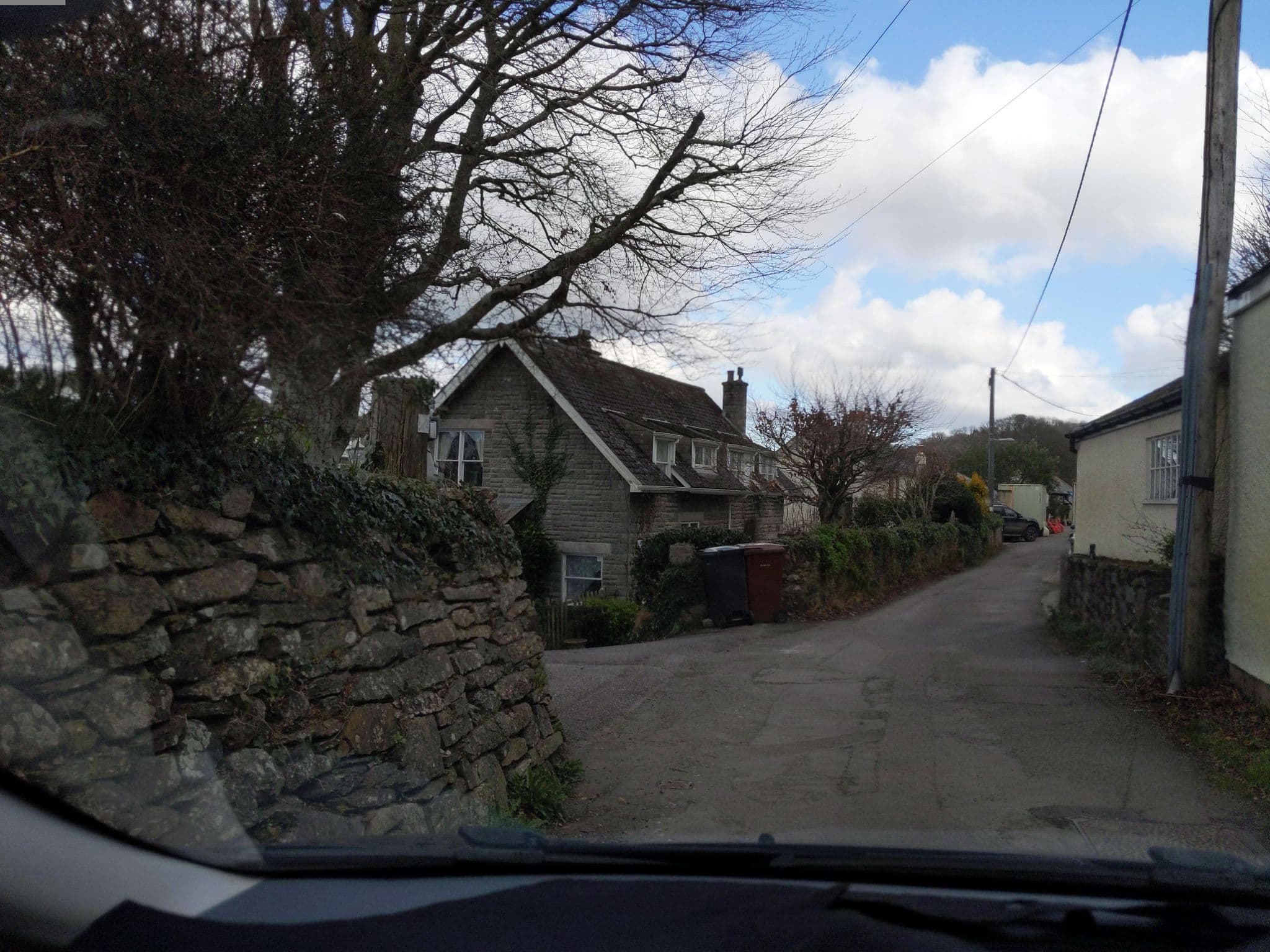 Street view near Yealm Cottages, Newton Ferrers — © WaggyDog (CC BY-SA · Mapillary)