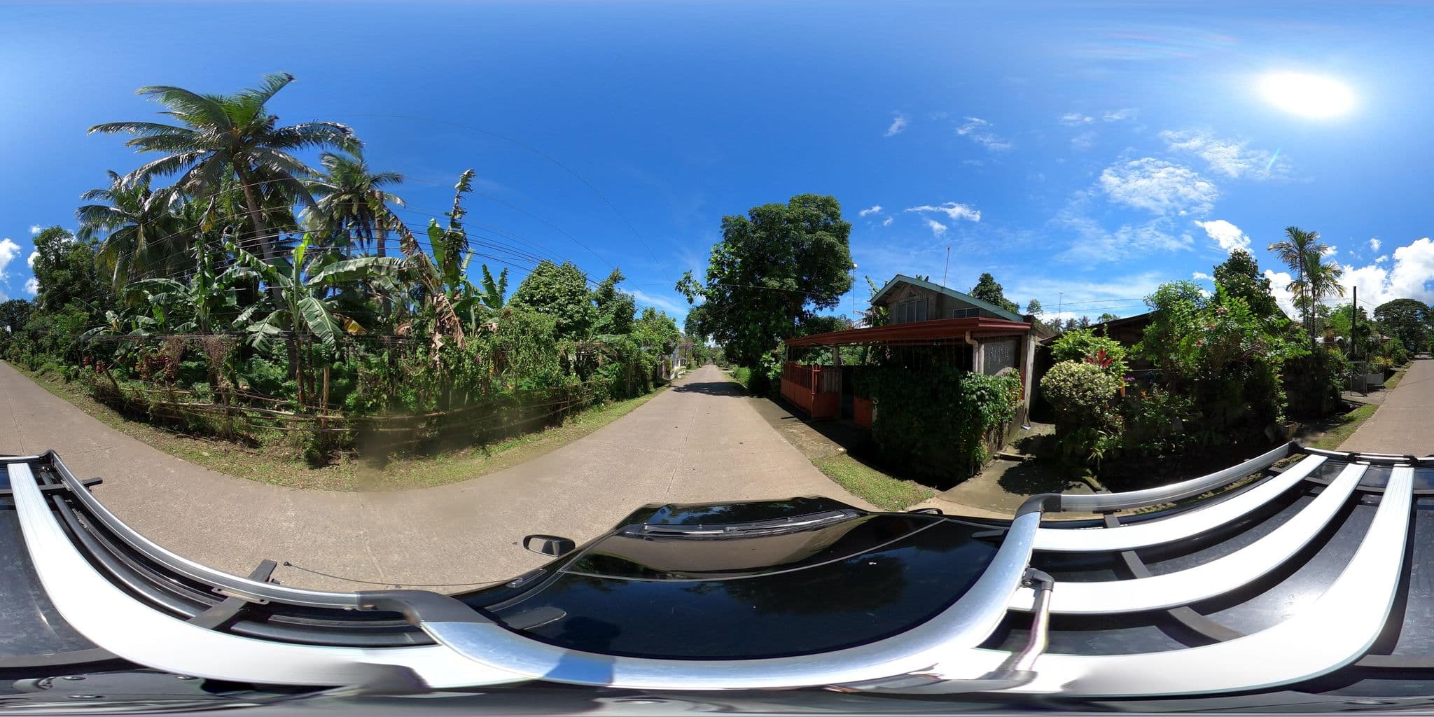 Street view near The Yellow House in Camiguin, Mambajao — © flashkiwi (CC BY-SA · Mapillary)