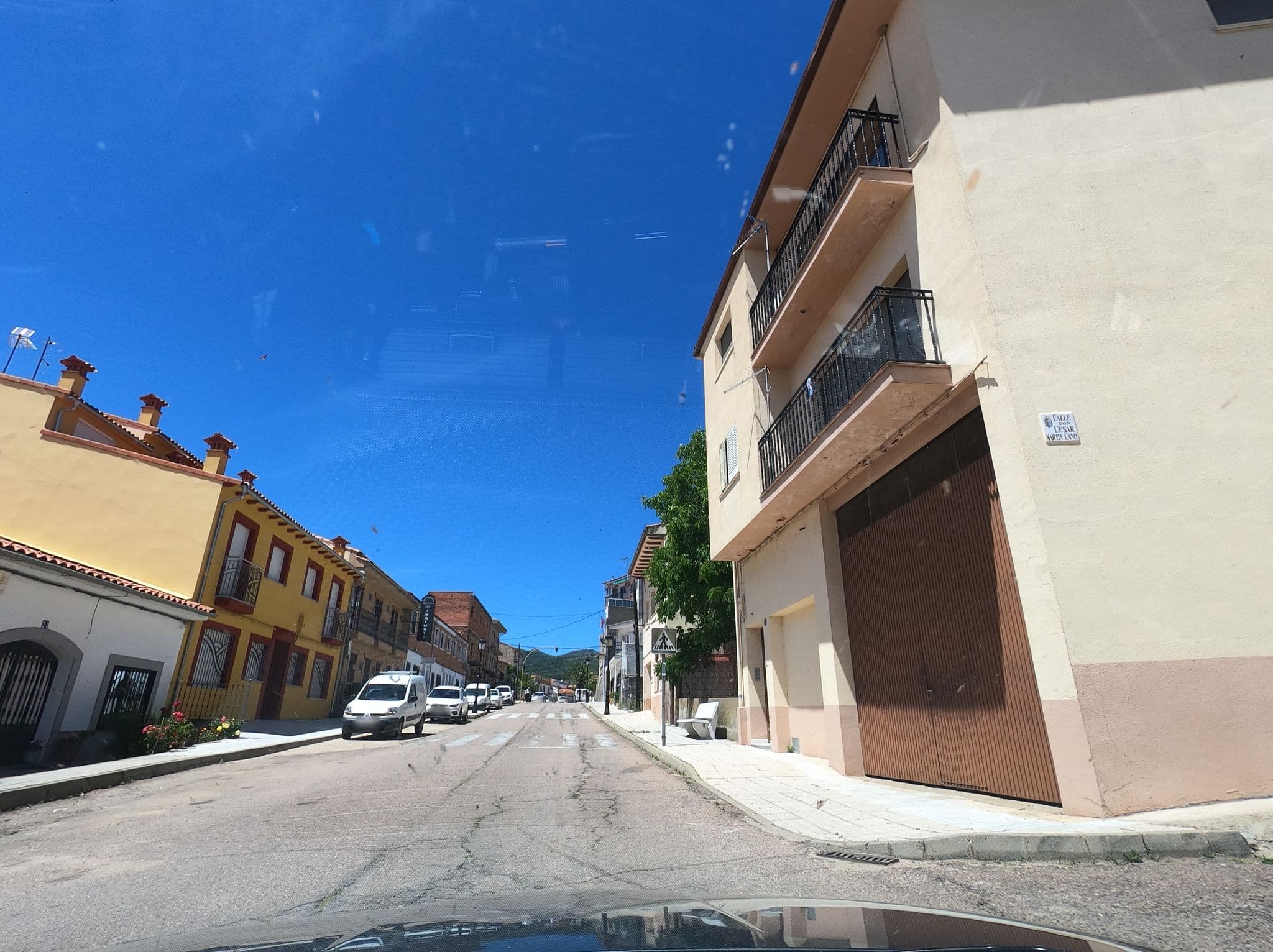 Street view near Apartamentos Turisticos Mirayuste, Guadalupe — © adrigrillo (CC BY-SA · Mapillary)