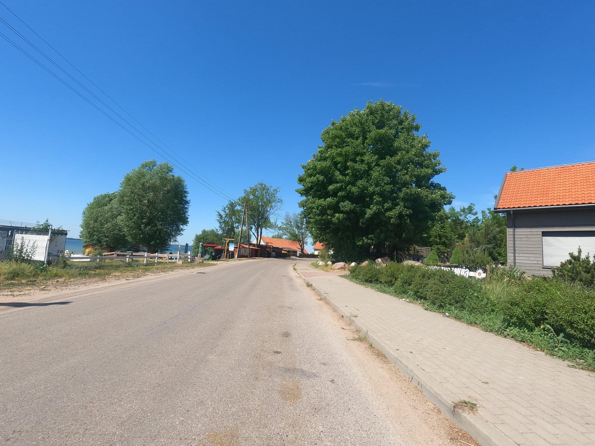 Street view near Nowe Guty Fun, Orzysz — © masterofnoroad (CC BY-SA · Mapillary)