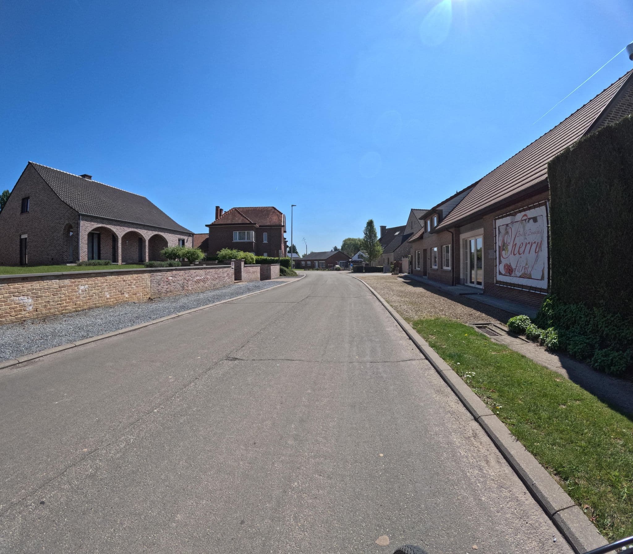 Street view near Cherryfarm Bakkershof, Brustem — © madel (CC BY-SA · Mapillary)