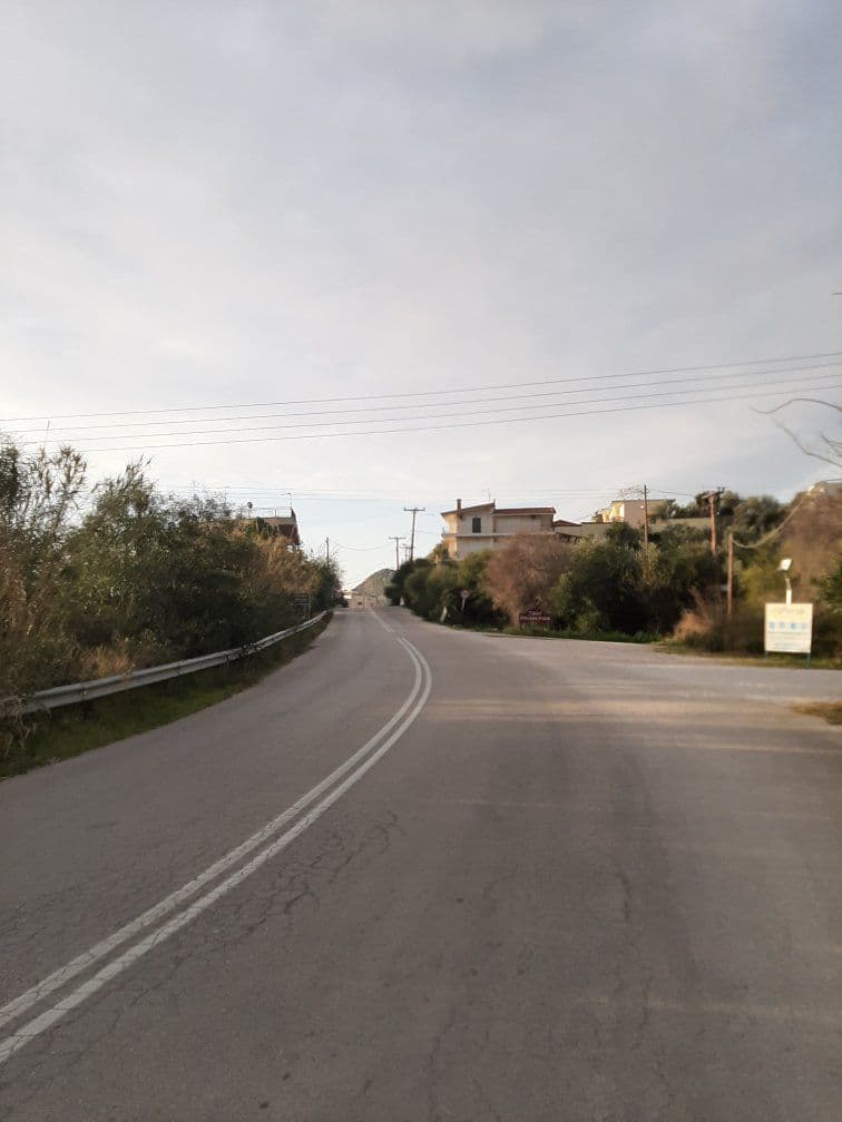 Street view near Διαμερίσματα και Στούντιο Μεράκι, Tolón — © sarant (CC BY-SA · Mapillary)