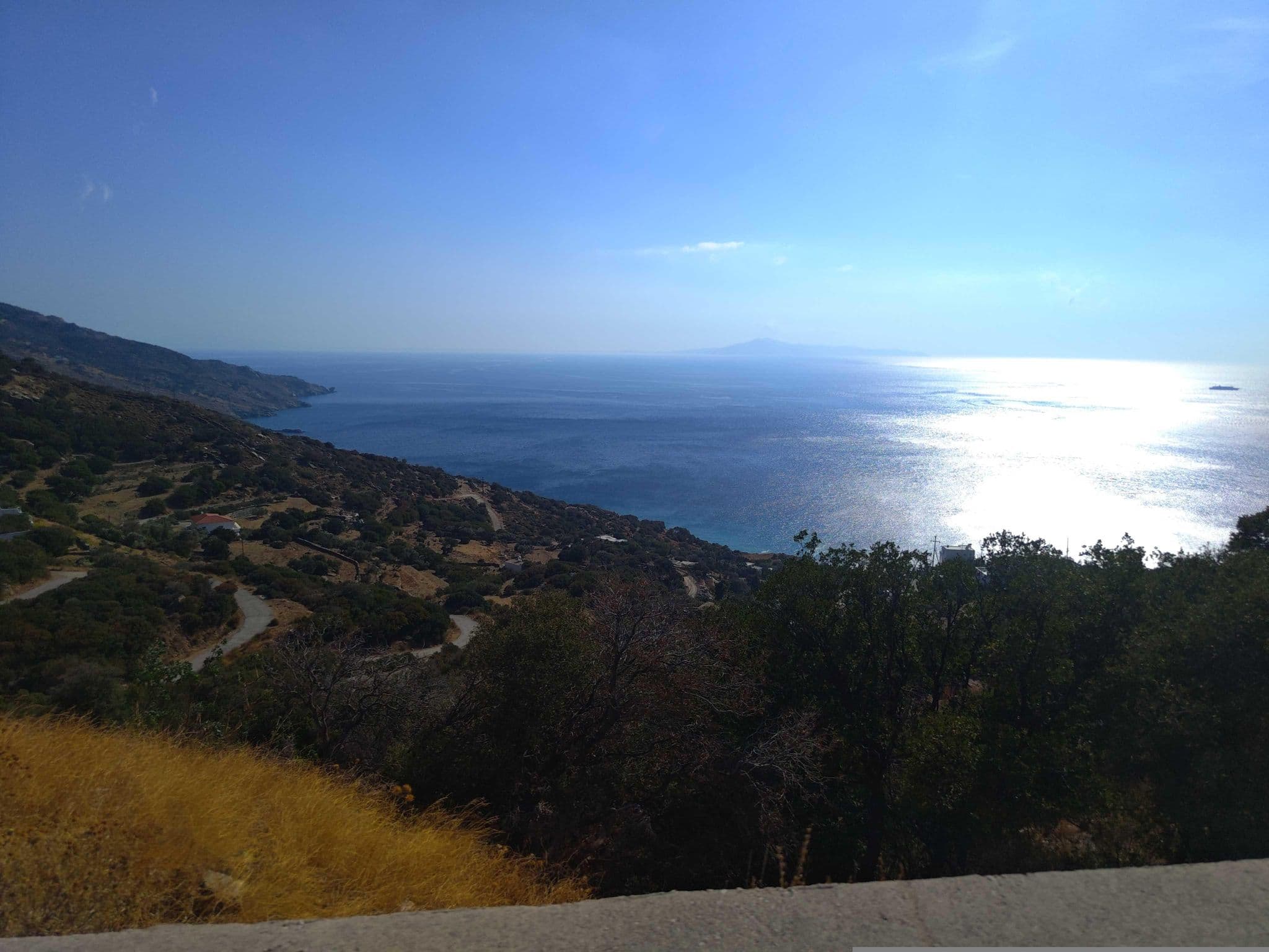 Street view near Aegean Castle Suites, Batsíon — © kibour (CC BY-SA · Mapillary)