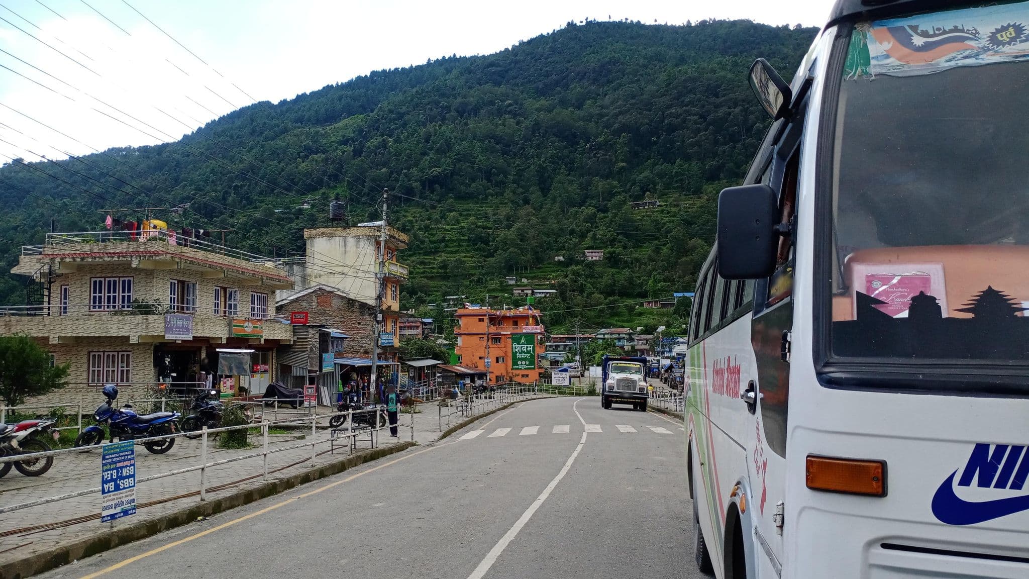 Street view near Hotel Gyabila, Chari̇̄koṭ — © Rebmad7 (CC BY-SA · Mapillary)