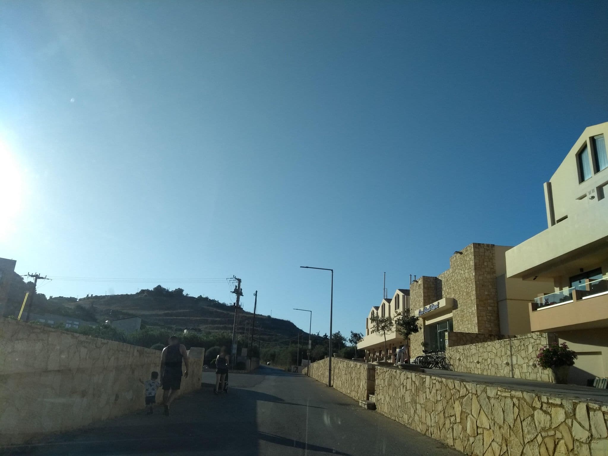 Street view near Kiani Beach Resort Family All Inclusive, Kalýves — © thetornado76 (CC BY-SA · Mapillary)