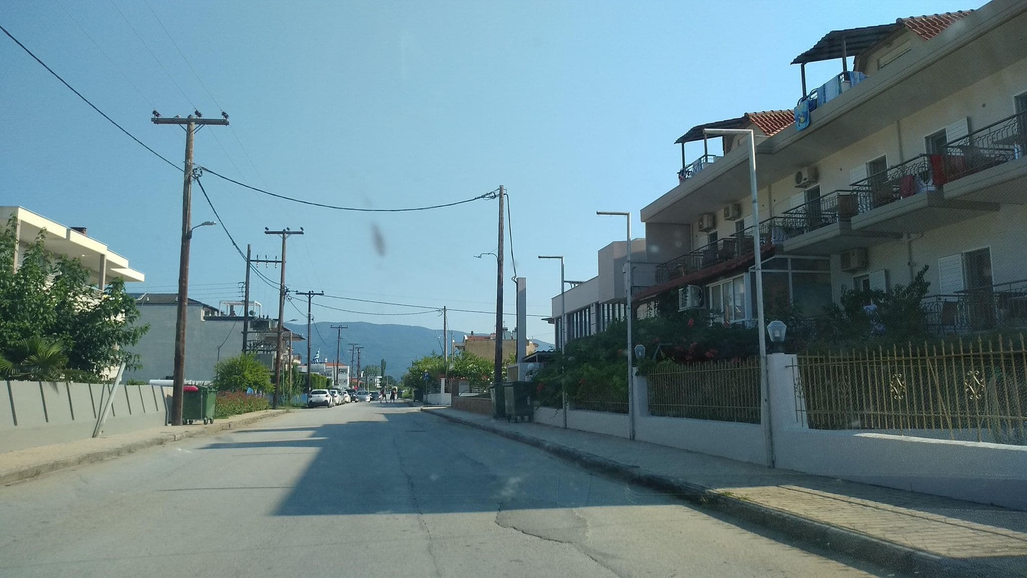 Street view near HOTEL RIHIOS ξενοδοχείο 3 αστερων, Stavrós — © tavi (CC BY-SA · Mapillary)