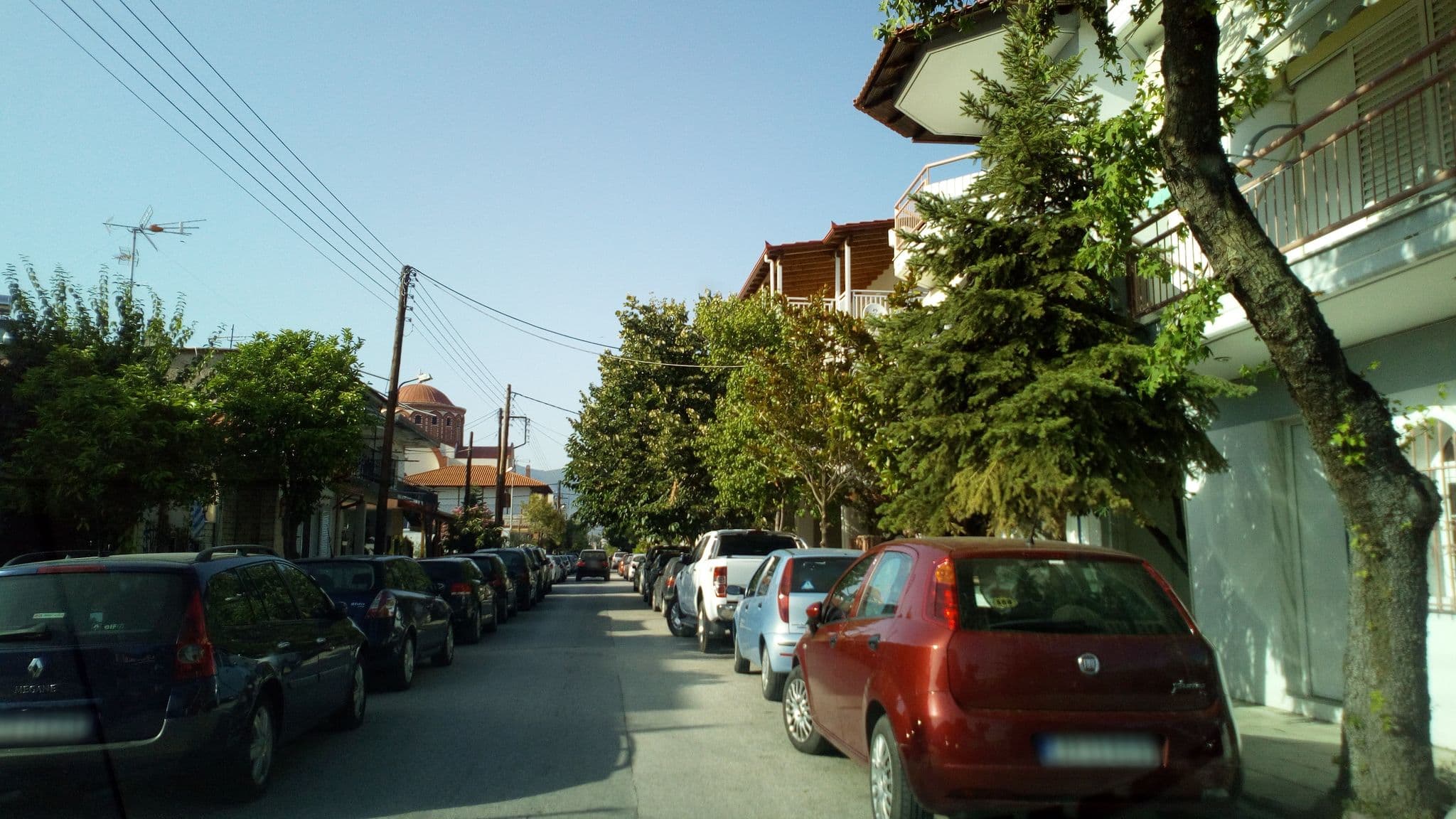 Street view near Boskos apartments, Néa Vrasná — © skarmoutsosv (CC BY-SA · Mapillary)
