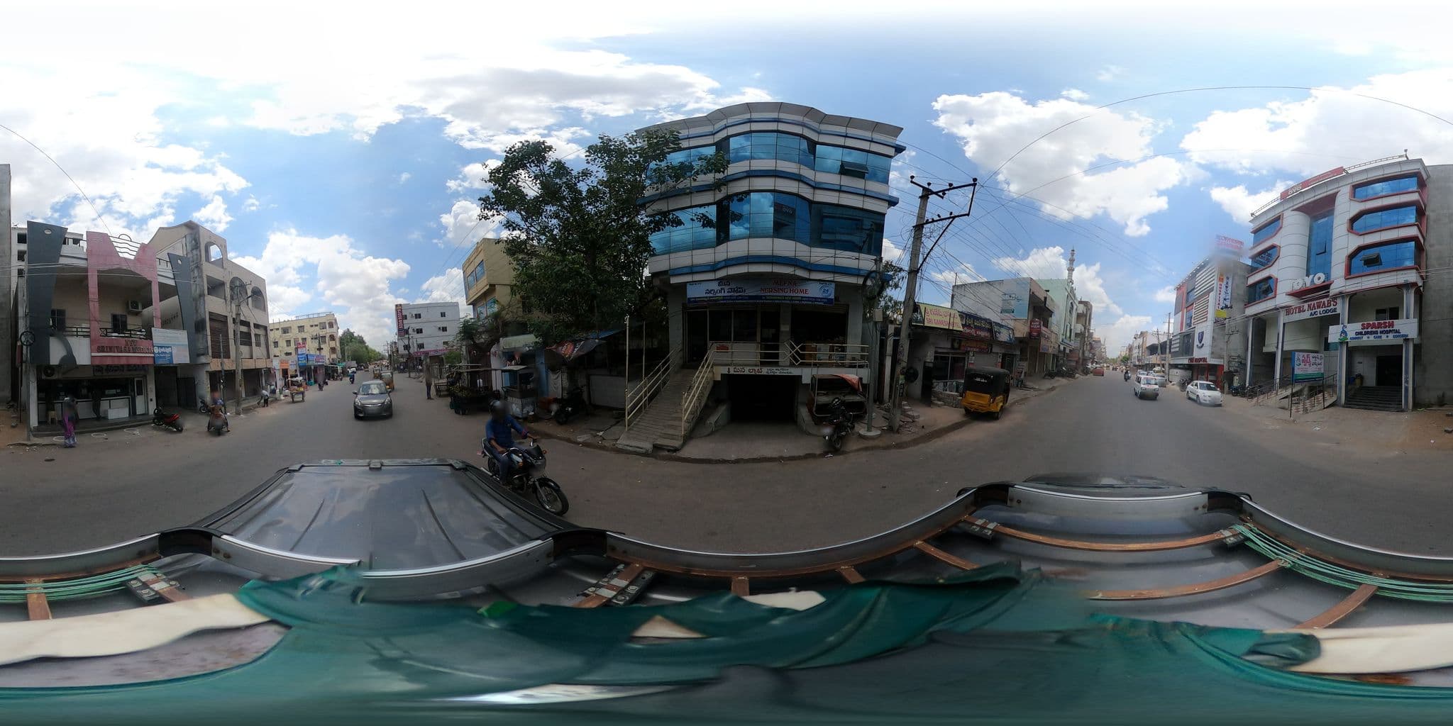 Street view near Hotel Nawab's, Karīmnagar — © brahmamgvs (CC BY-SA · Mapillary)