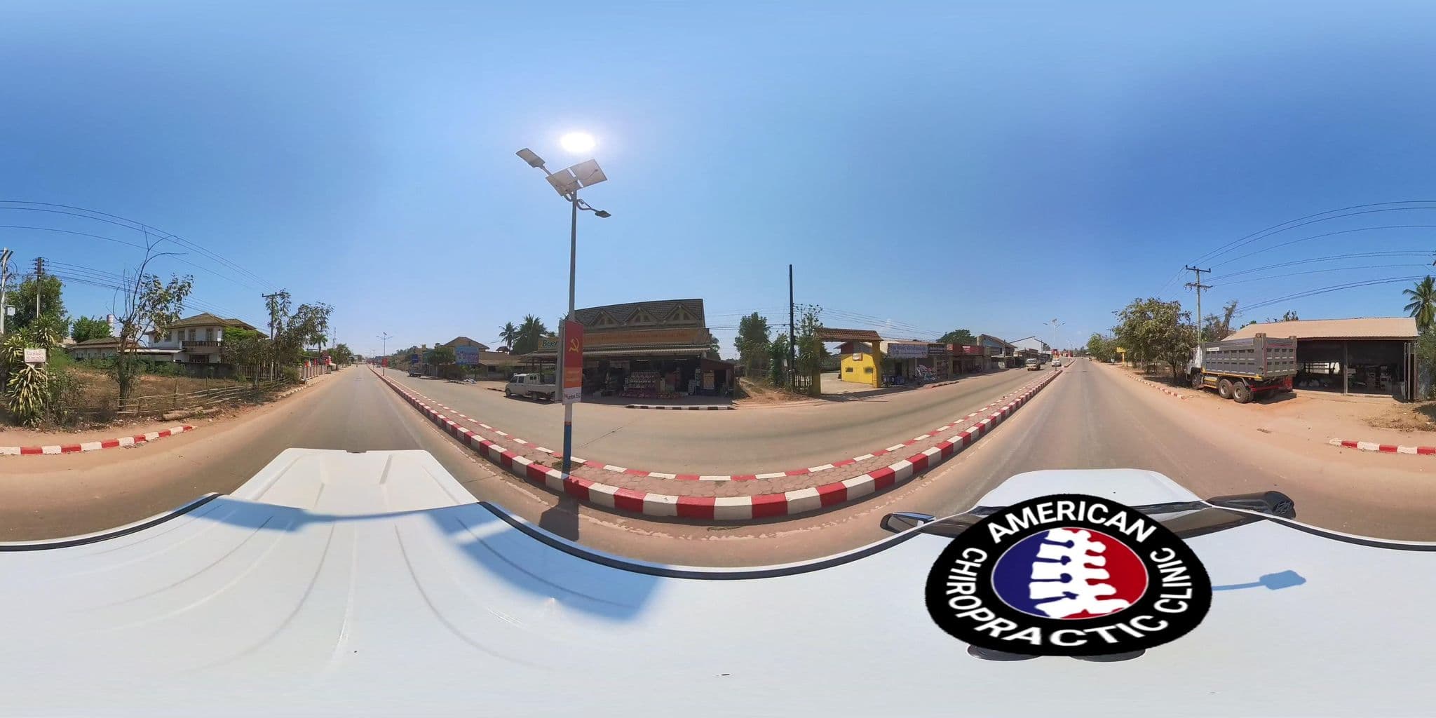Street view near Khambai Guesthouse, Muang Phôn-Hông — © DrLogan (CC BY-SA · Mapillary)