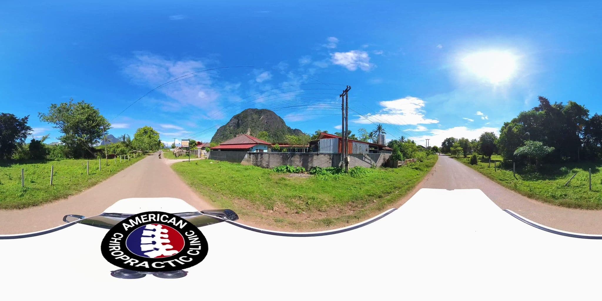 Street view near Maneesingdee Guesthouse, Muang Phôn-Hông — © DrLogan (CC BY-SA · Mapillary)
